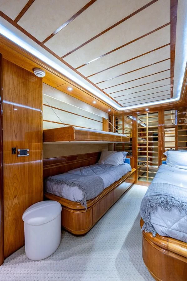 a bedroom with a bunk bed aboard EVERYTHING GOOD Yacht for Sale