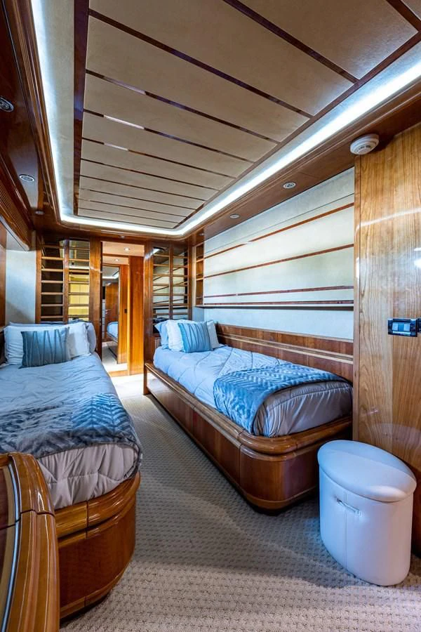 a room with two beds aboard EVERYTHING GOOD Yacht for Sale
