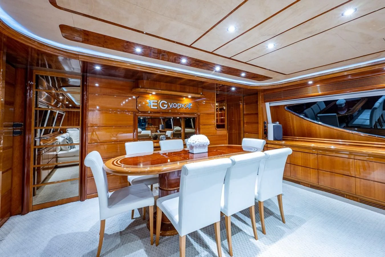 a restaurant with tables and chairs aboard EVERYTHING GOOD Yacht for Sale