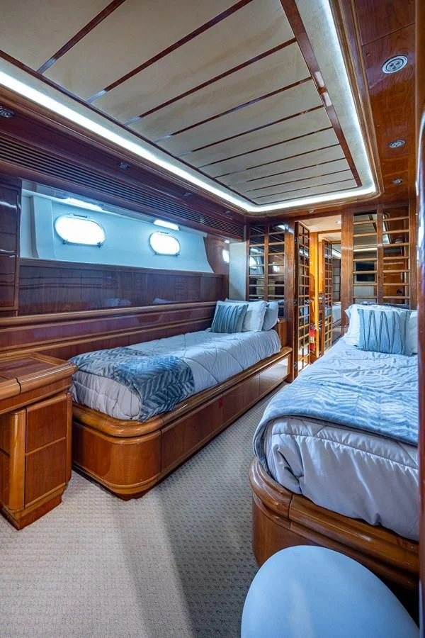 a room with bunk beds aboard EVERYTHING GOOD Yacht for Sale
