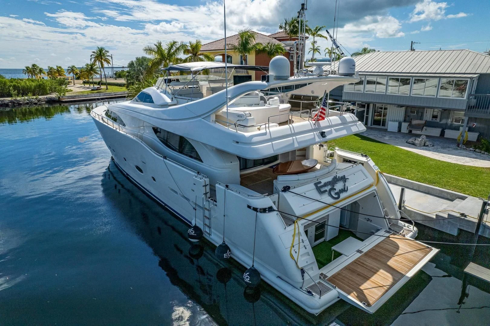 a boat docked at a pier aboard EVERYTHING GOOD Yacht for Sale