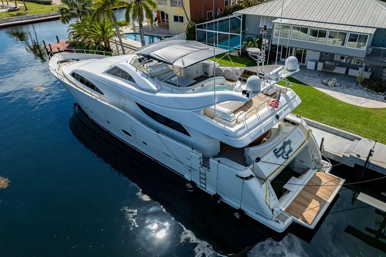 a boat docked in a harbor aboard EVERYTHING GOOD Yacht for Sale