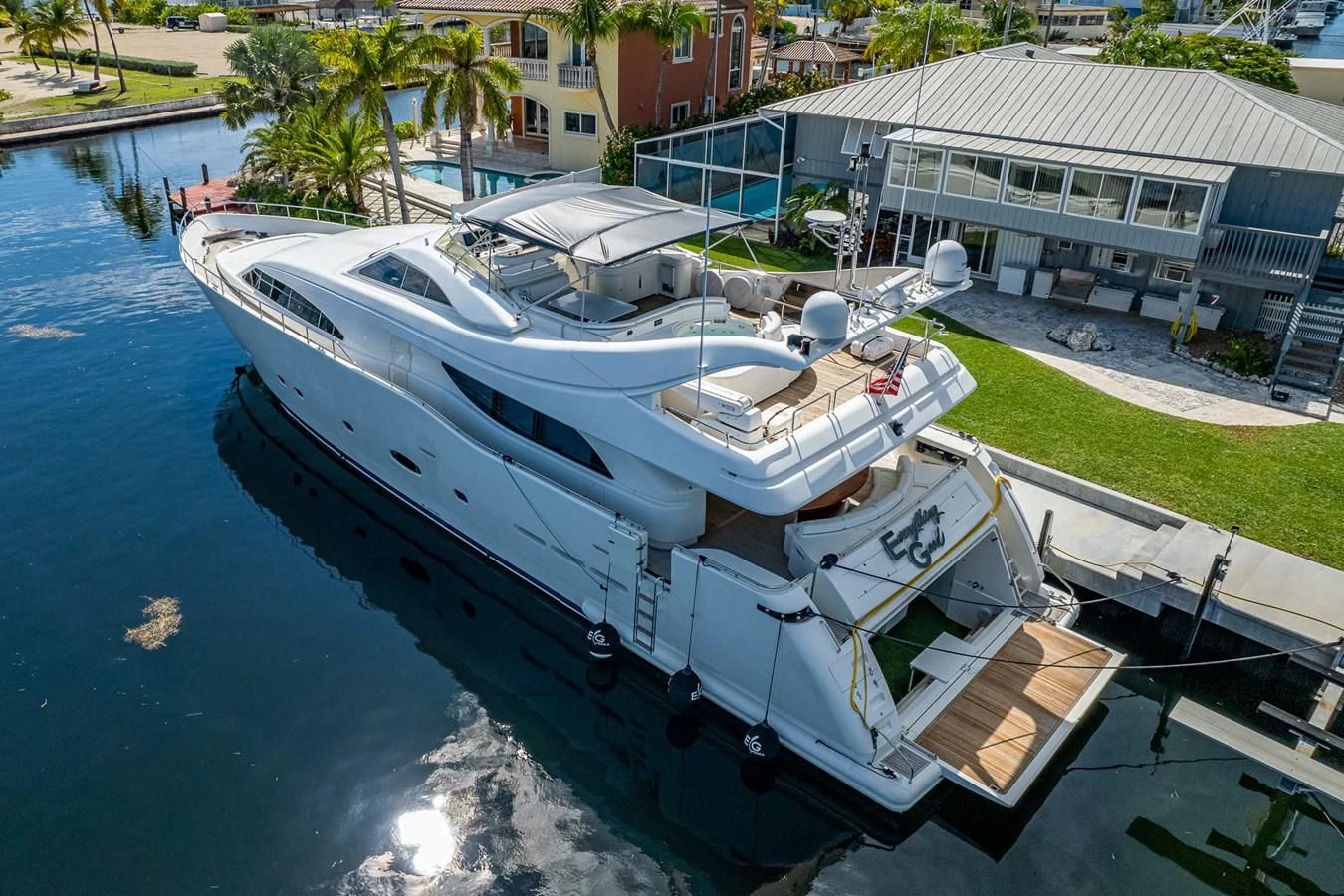 a boat docked at a pier aboard EVERYTHING GOOD Yacht for Sale