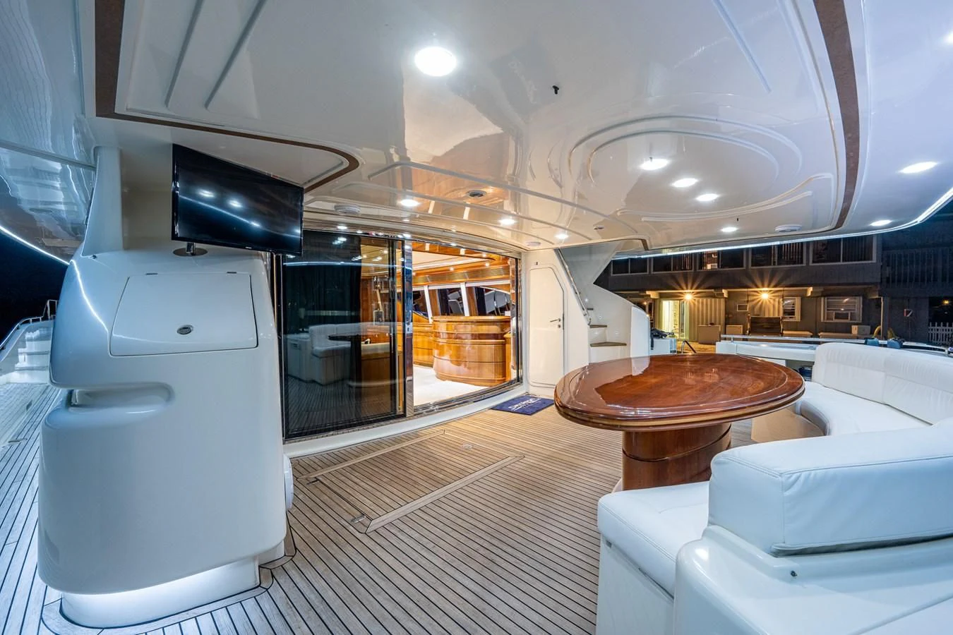 a room with a table and chairs aboard EVERYTHING GOOD Yacht for Sale