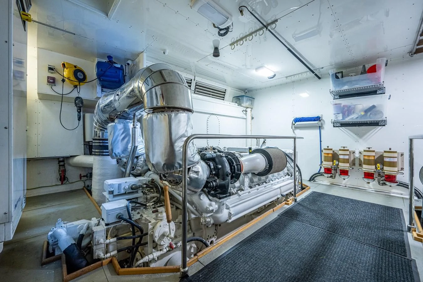 a large machine in a room aboard EVERYTHING GOOD Yacht for Sale
