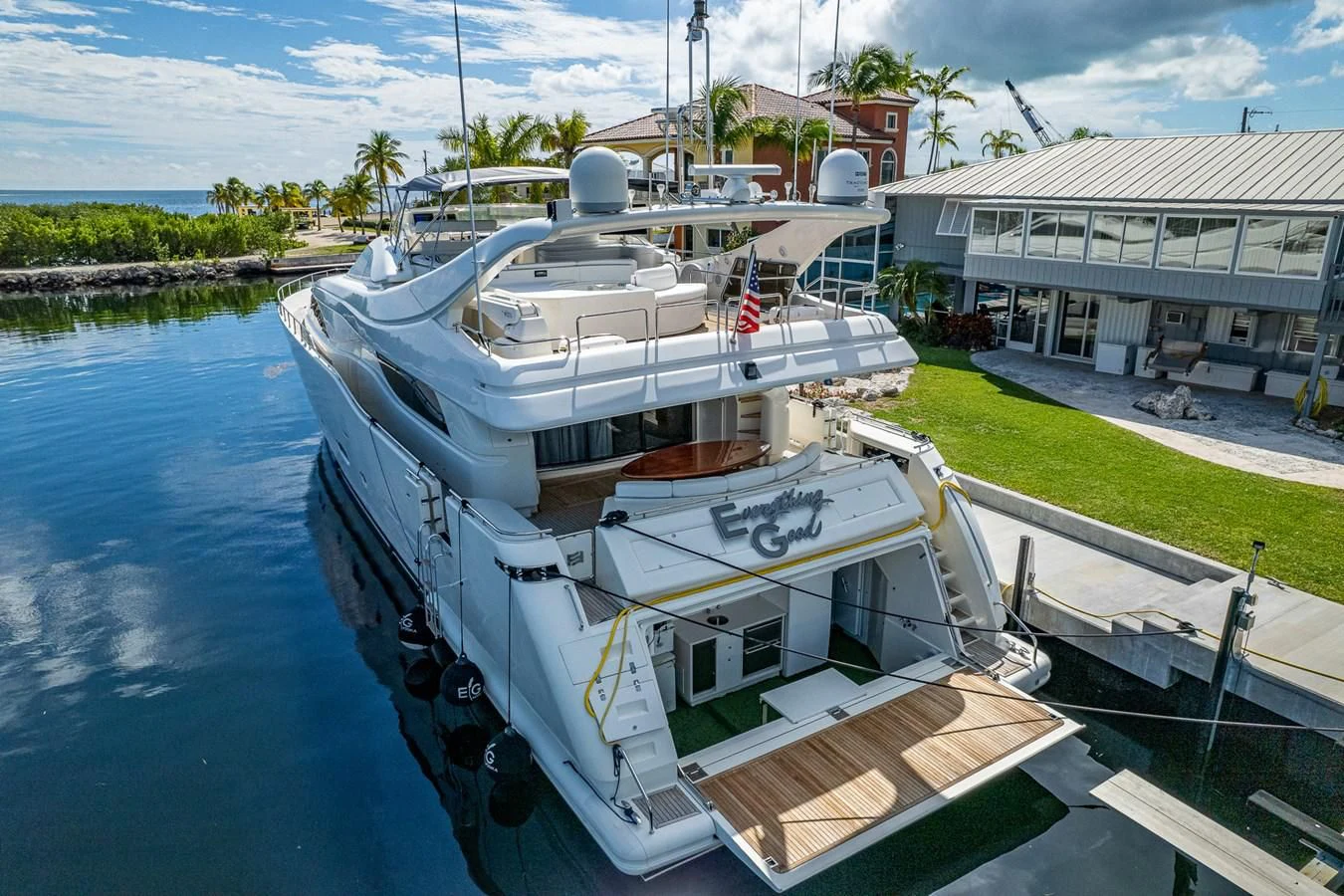 a boat docked at a pier aboard EVERYTHING GOOD Yacht for Sale