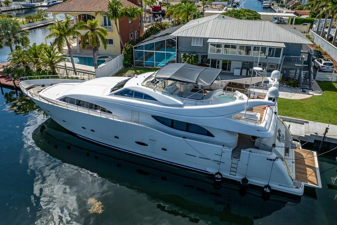 a boat docked at a pier aboard EVERYTHING GOOD Yacht for Sale