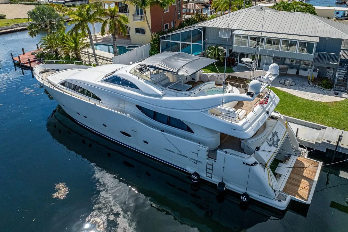 a boat docked at a pier aboard EVERYTHING GOOD Yacht for Sale