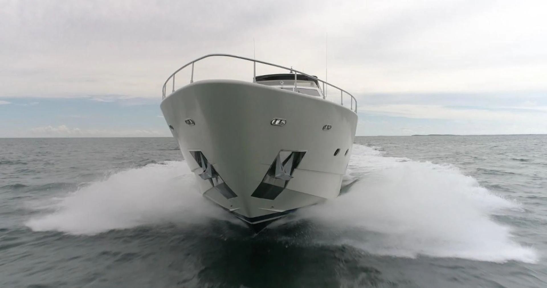 a white boat in the water aboard EVERYTHING GOOD Yacht for Sale