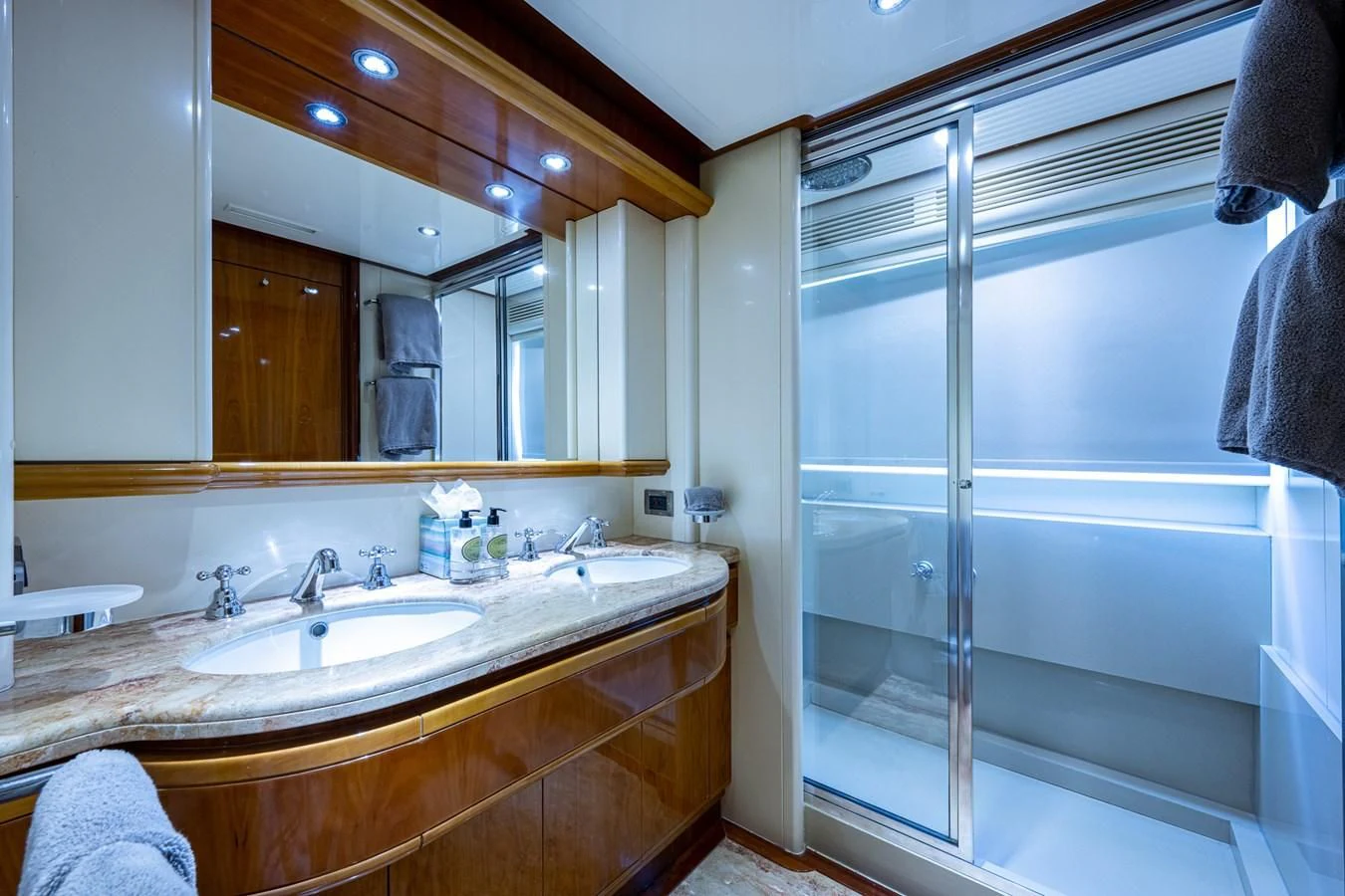 a bathroom with a sink and a shower aboard EVERYTHING GOOD Yacht for Sale