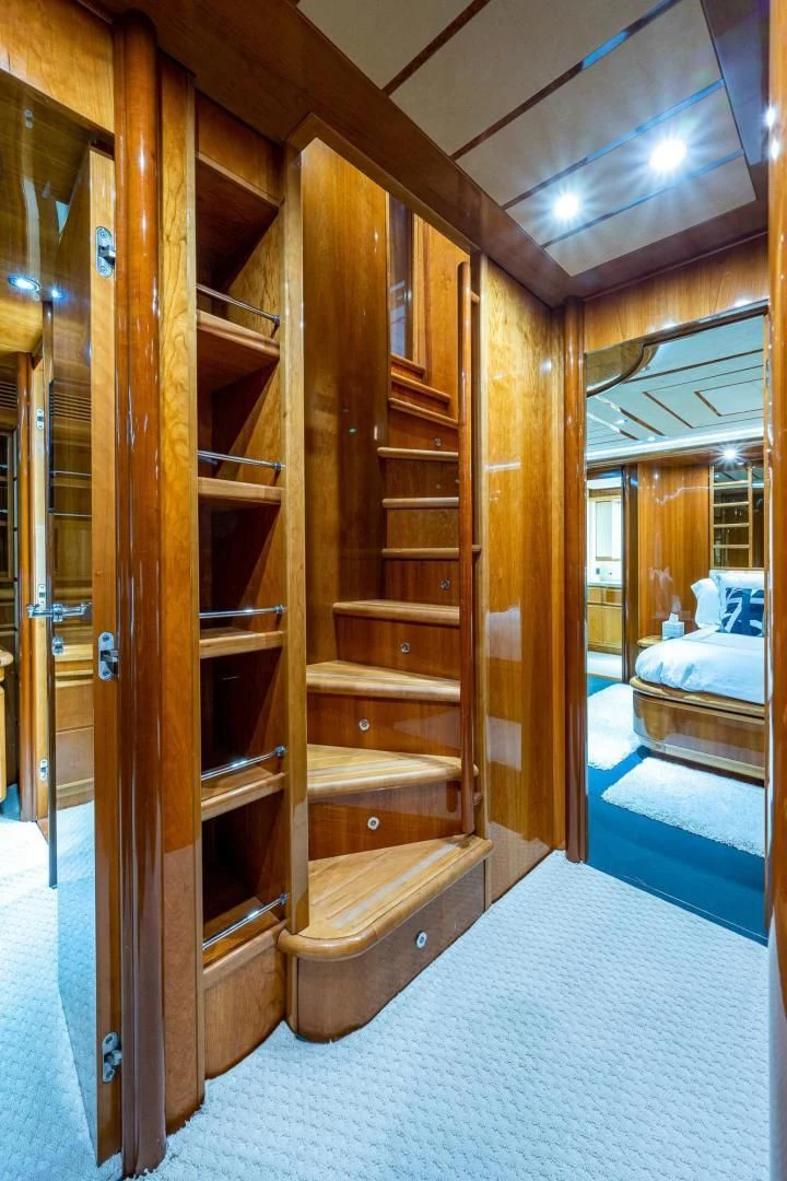 a wood cabinet in a room aboard EVERYTHING GOOD Yacht for Sale