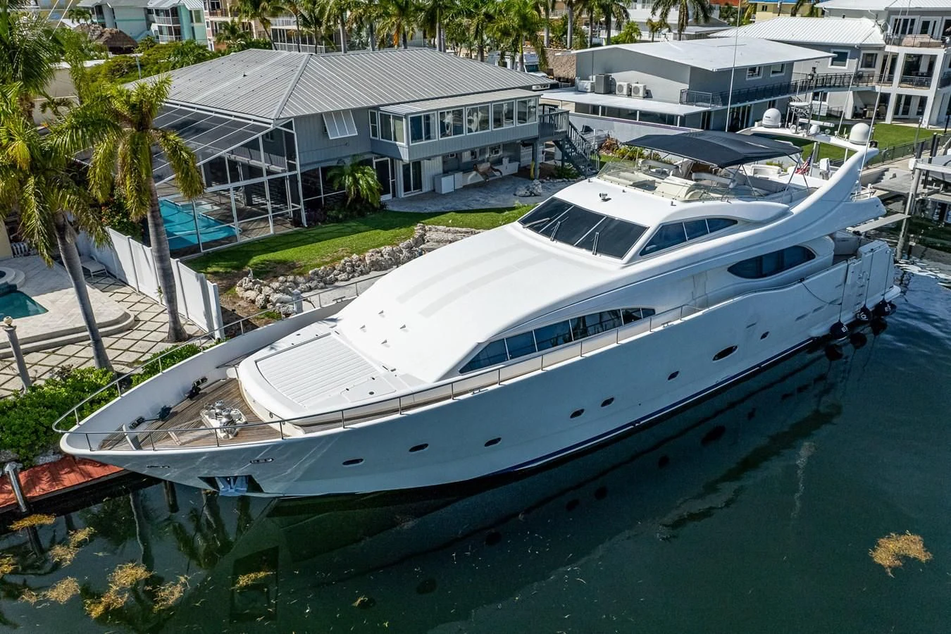 a large white yacht docked aboard EVERYTHING GOOD Yacht for Sale