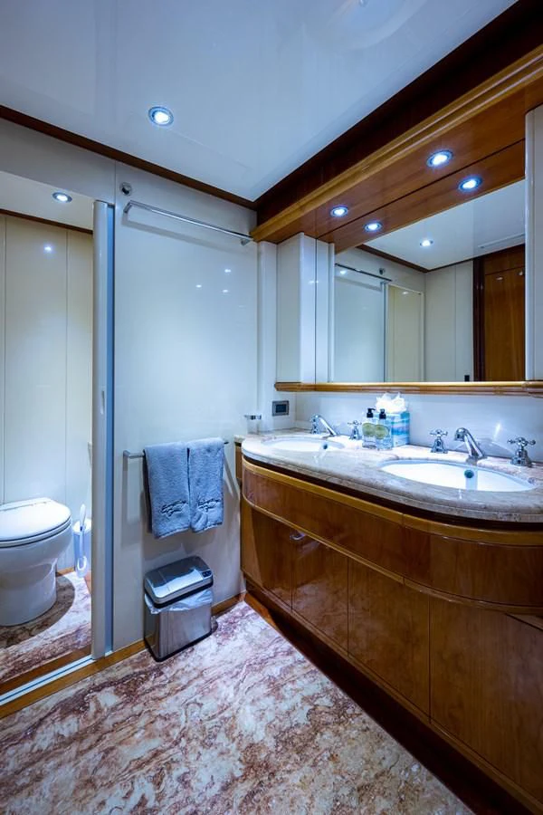 a bathroom with a standup shower aboard EVERYTHING GOOD Yacht for Sale