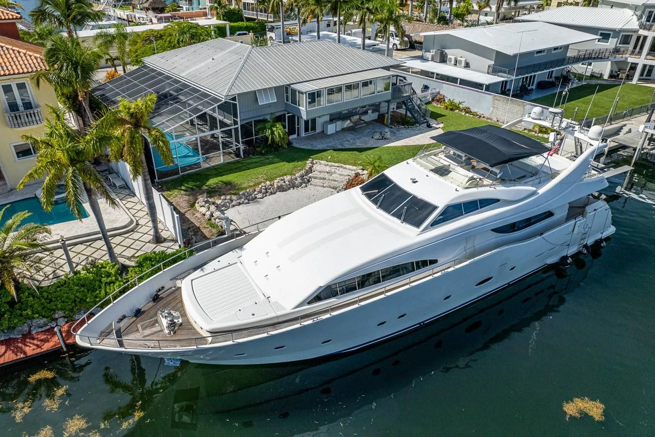 a boat docked in a harbor aboard EVERYTHING GOOD Yacht for Sale