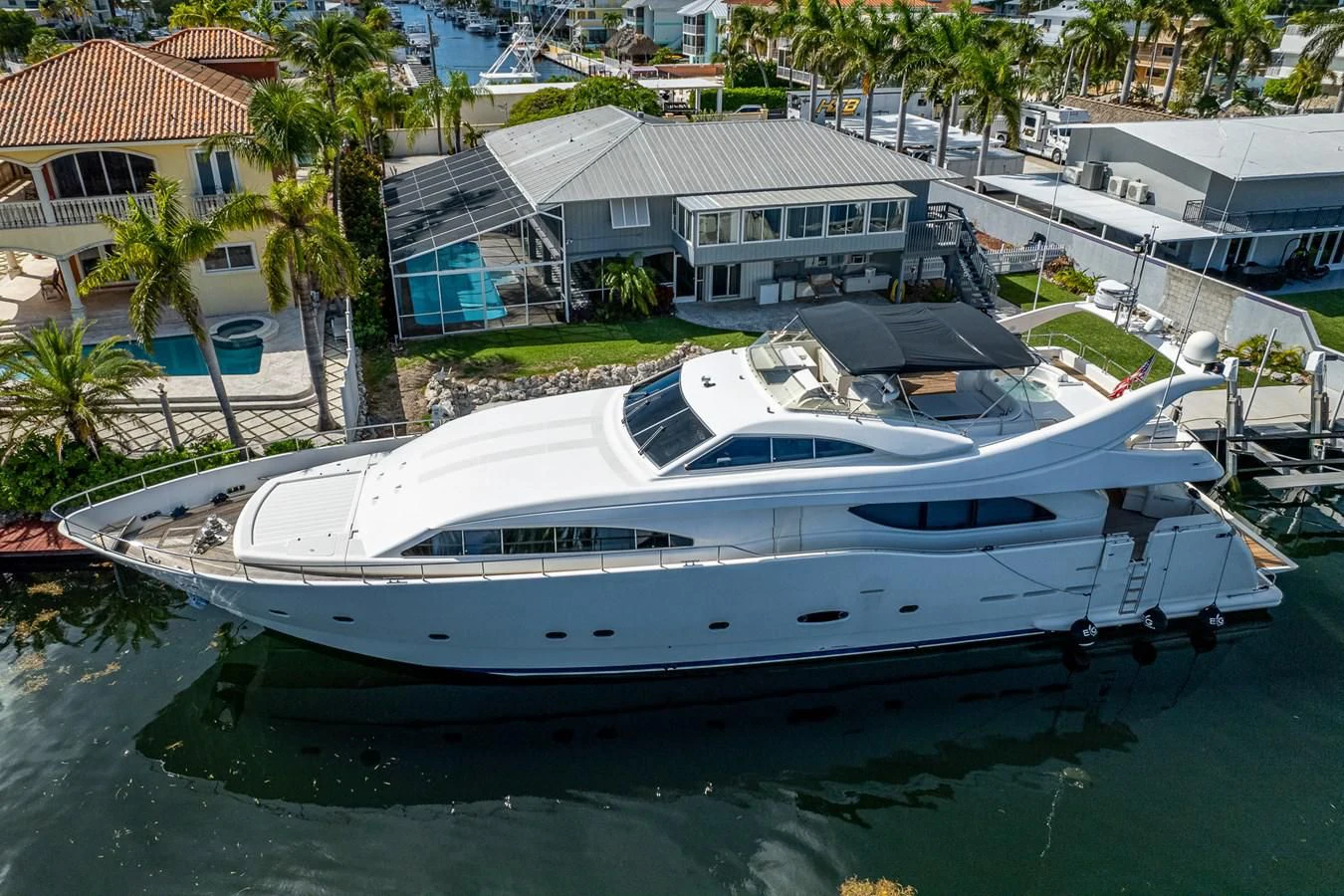 a yacht docked at a pier aboard EVERYTHING GOOD Yacht for Sale