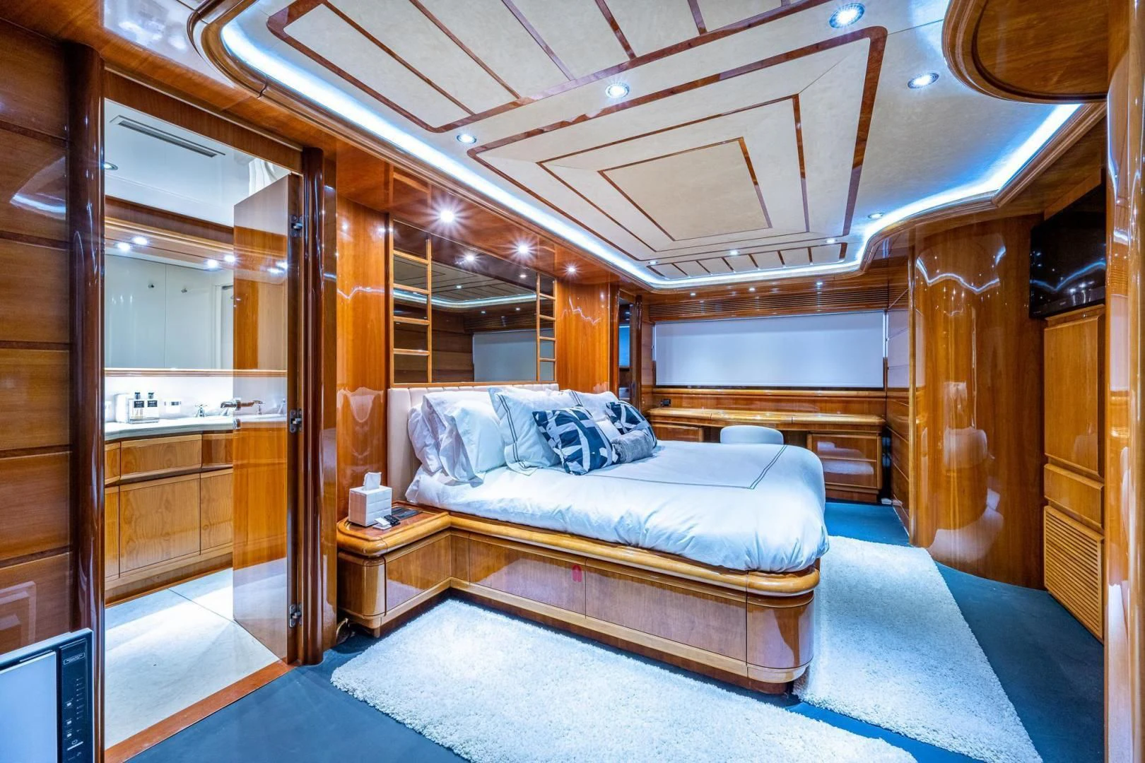 a bed in a room aboard EVERYTHING GOOD Yacht for Sale