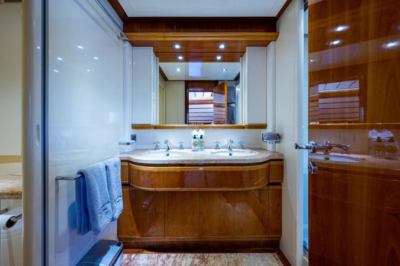 a bathroom with a sink and a mirror aboard EVERYTHING GOOD Yacht for Sale