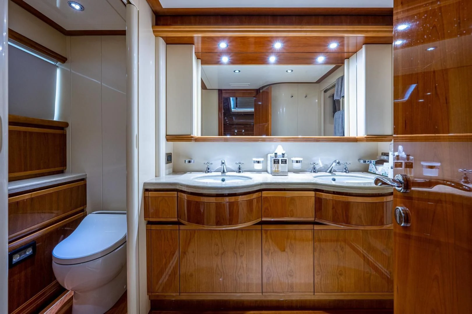 a bathroom with a sink and a toilet aboard EVERYTHING GOOD Yacht for Sale