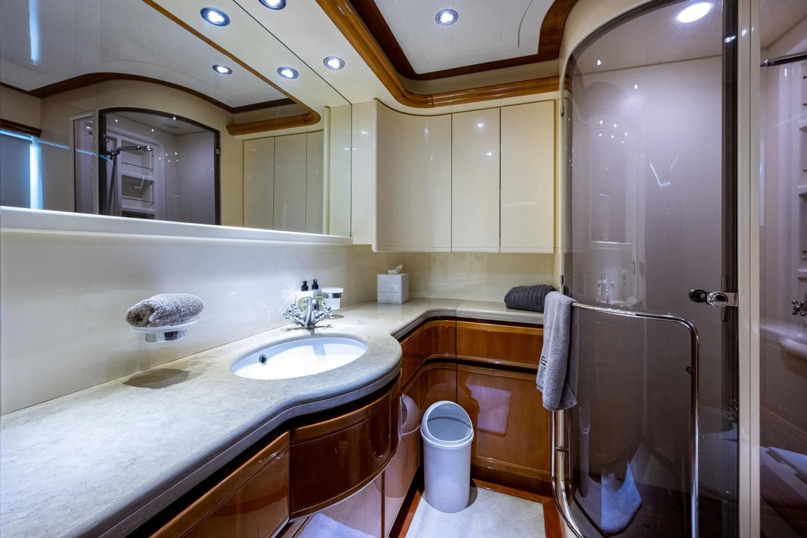 a bathroom with a sink and a shower aboard EVERYTHING GOOD Yacht for Sale