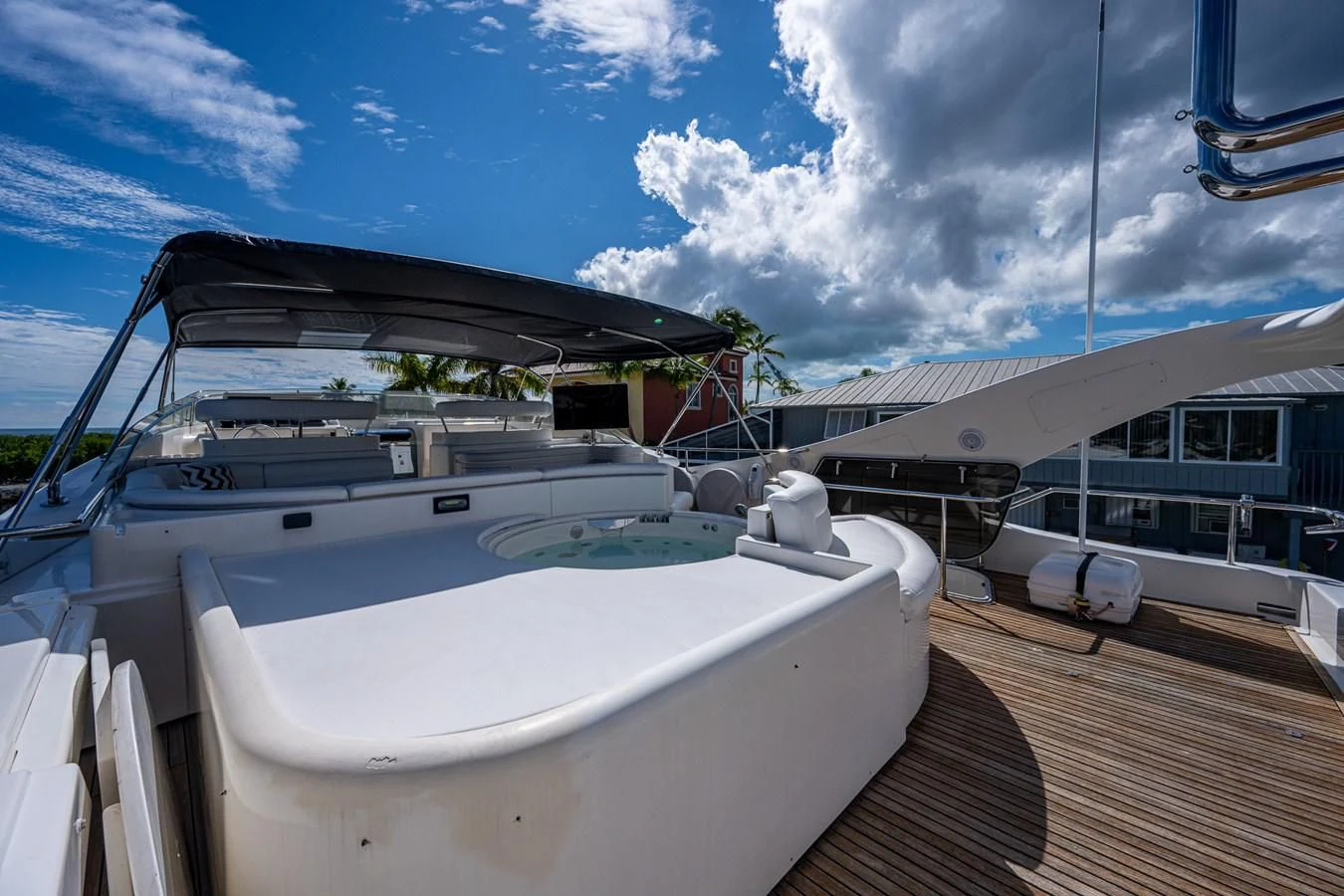 a boat docked at a pier aboard EVERYTHING GOOD Yacht for Sale