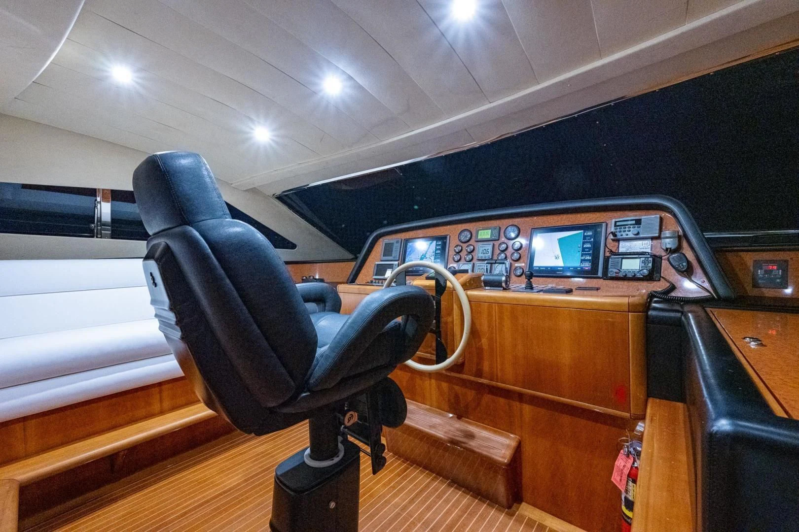 a leather chair in a room aboard EVERYTHING GOOD Yacht for Sale