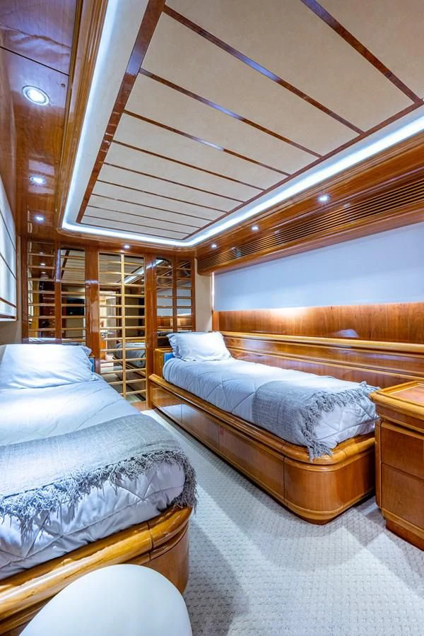 a room with bunk beds aboard EVERYTHING GOOD Yacht for Sale