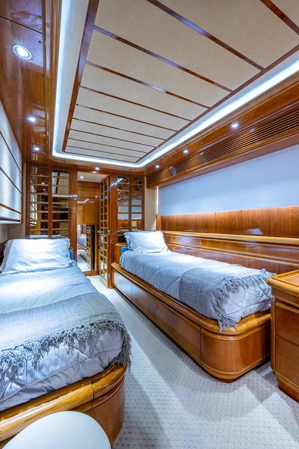 a room with bunk beds aboard EVERYTHING GOOD Yacht for Sale