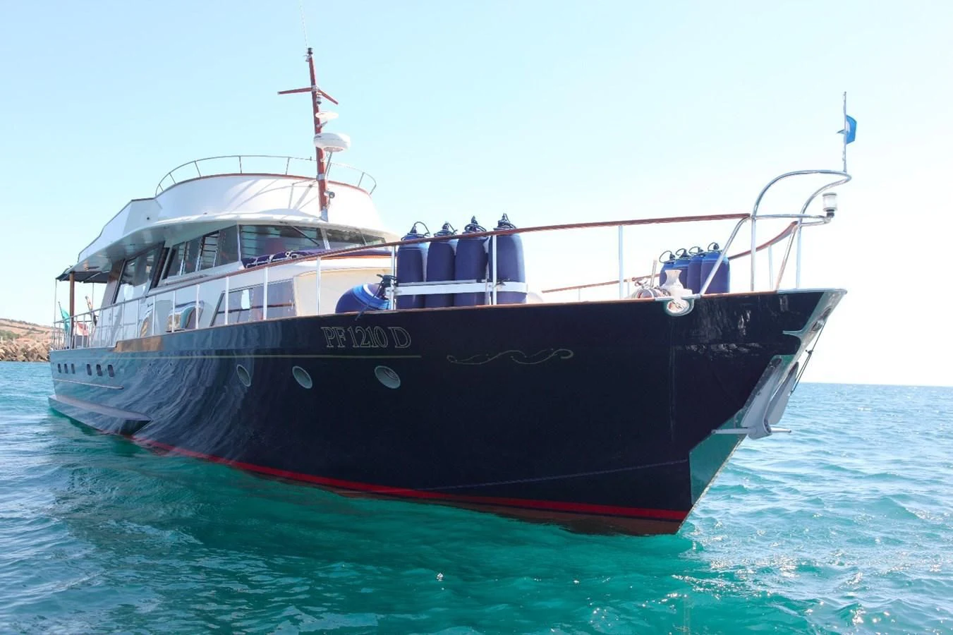 a boat in the water aboard UNICA Yacht for Sale