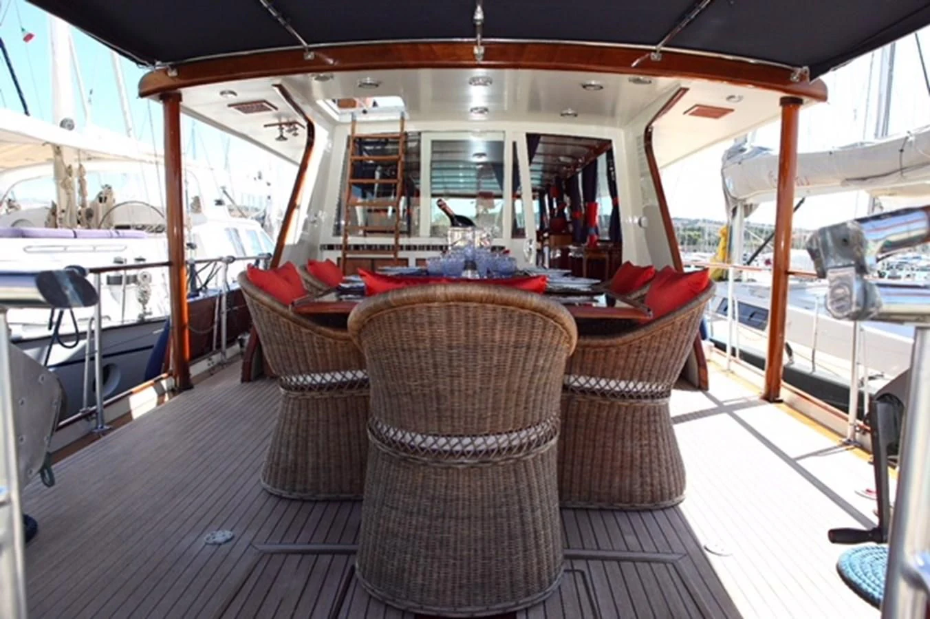 a boat with a couch aboard UNICA Yacht for Sale