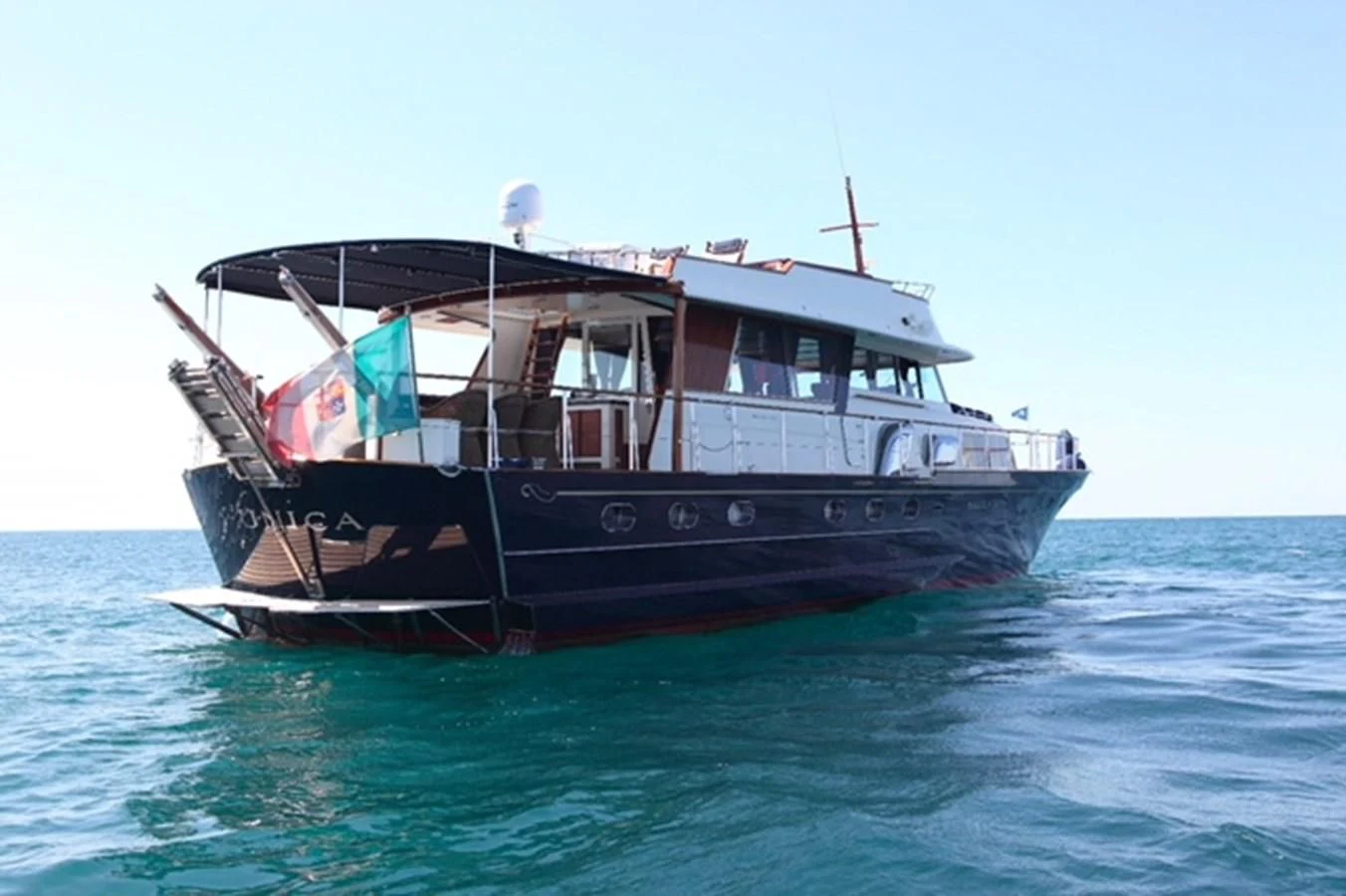 a boat on the water aboard UNICA Yacht for Sale