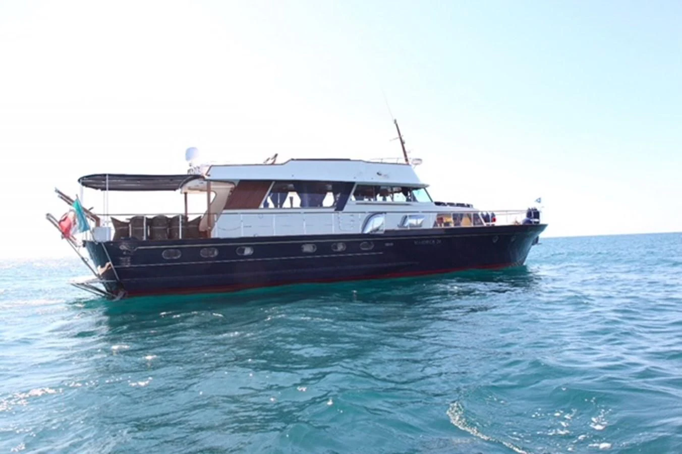 a boat in the water aboard UNICA Yacht for Sale
