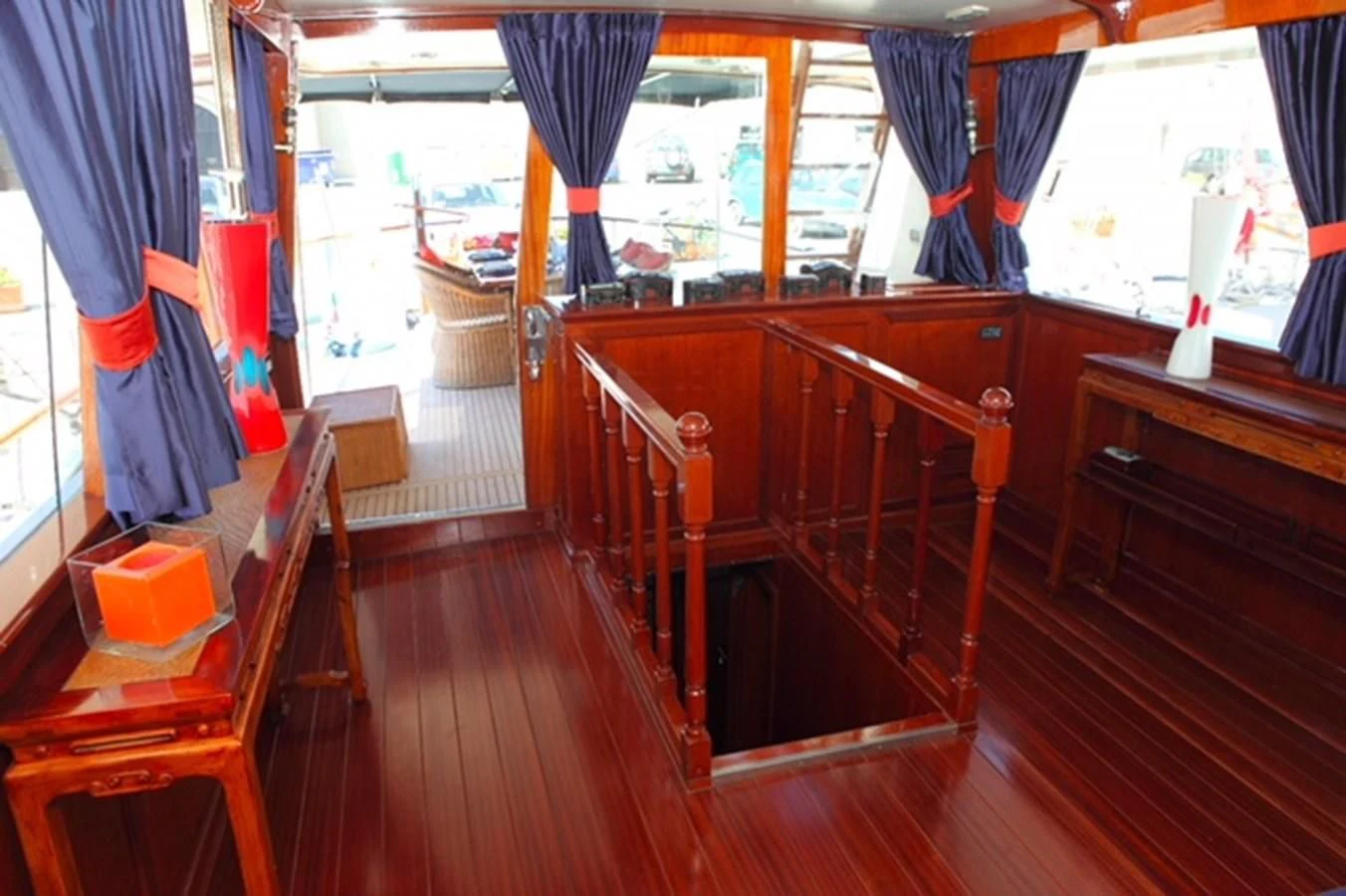 a wooden staircase in a room aboard UNICA Yacht for Sale