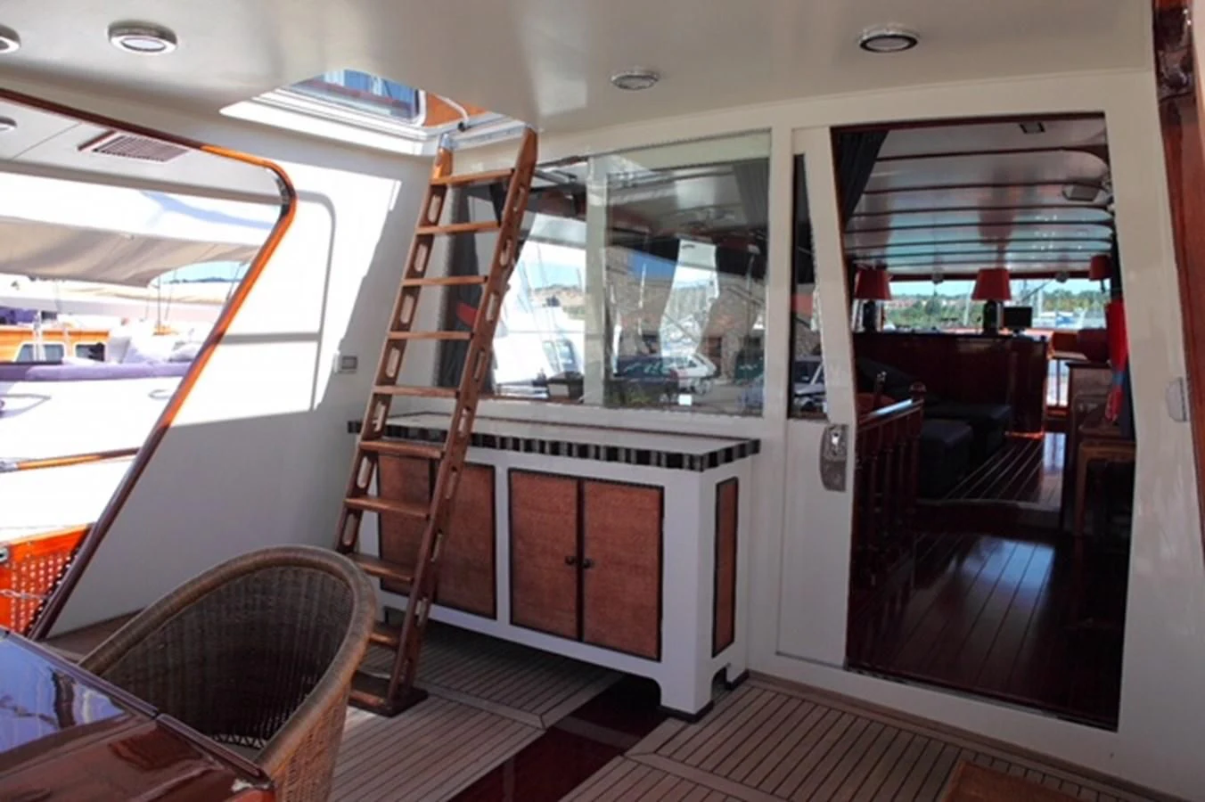 a room with a staircase and a window aboard UNICA Yacht for Sale