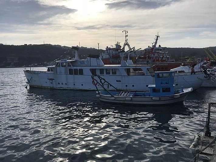a group of boats on the water aboard SEALION Yacht for Sale