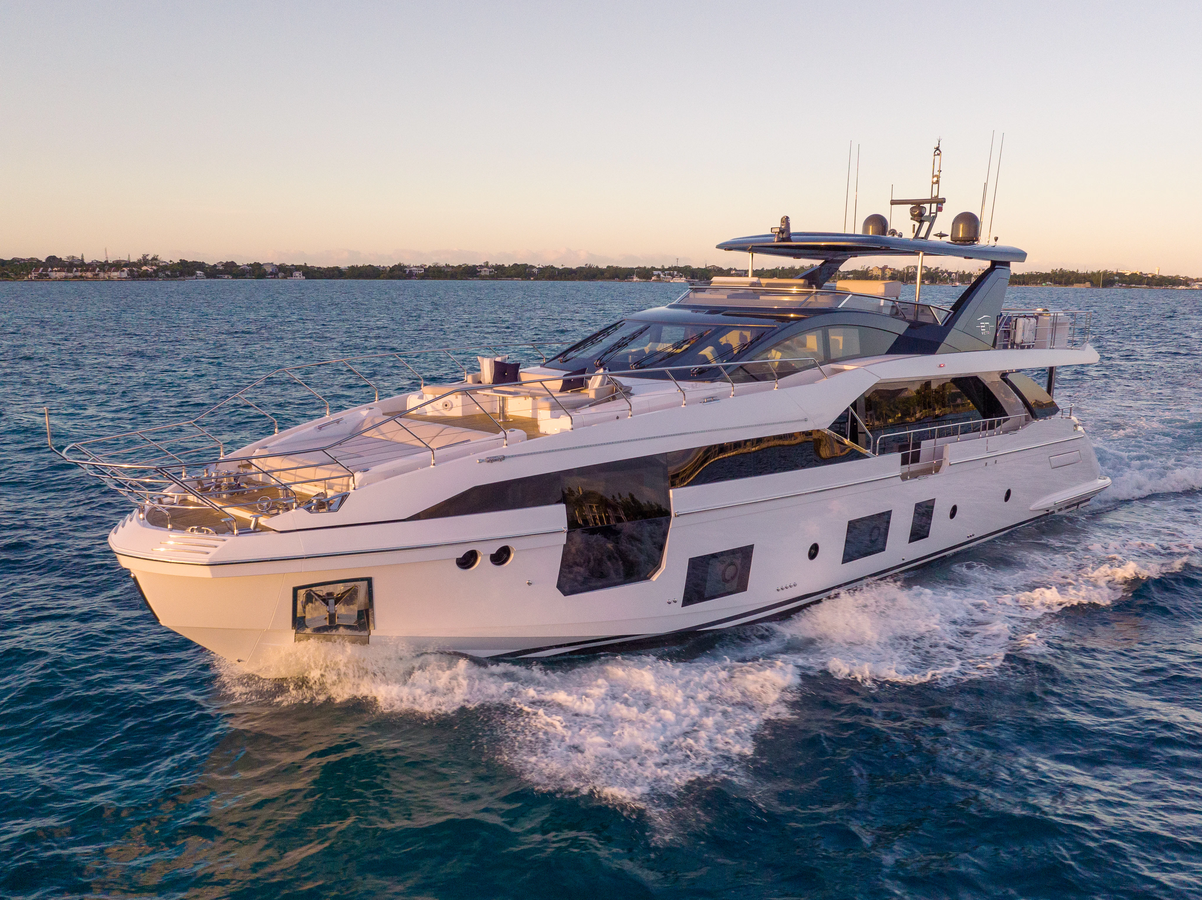 a white yacht on the water aboard SEA OWL Yacht for Sale