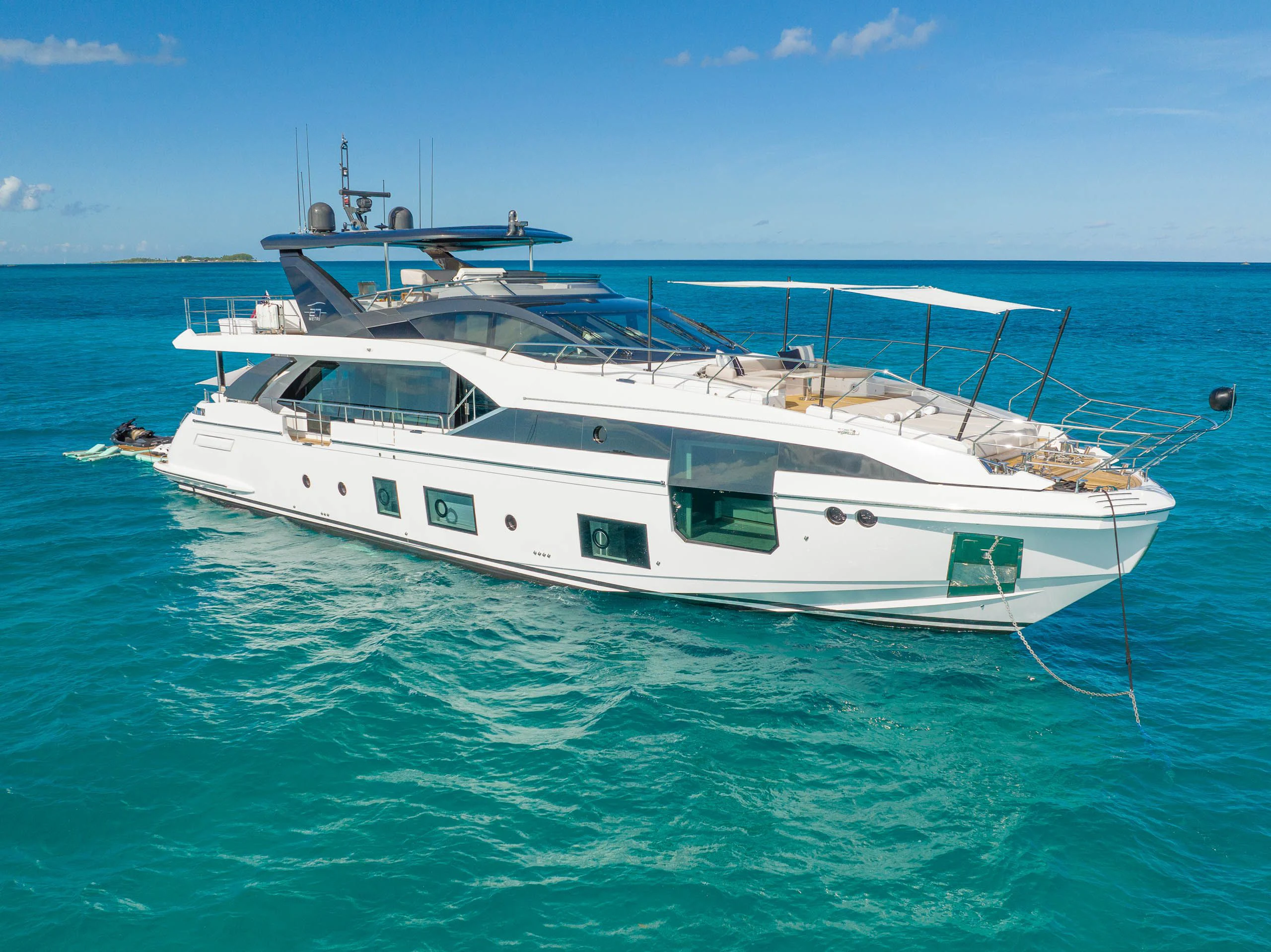 a white boat in the water aboard SEA OWL Yacht for Sale
