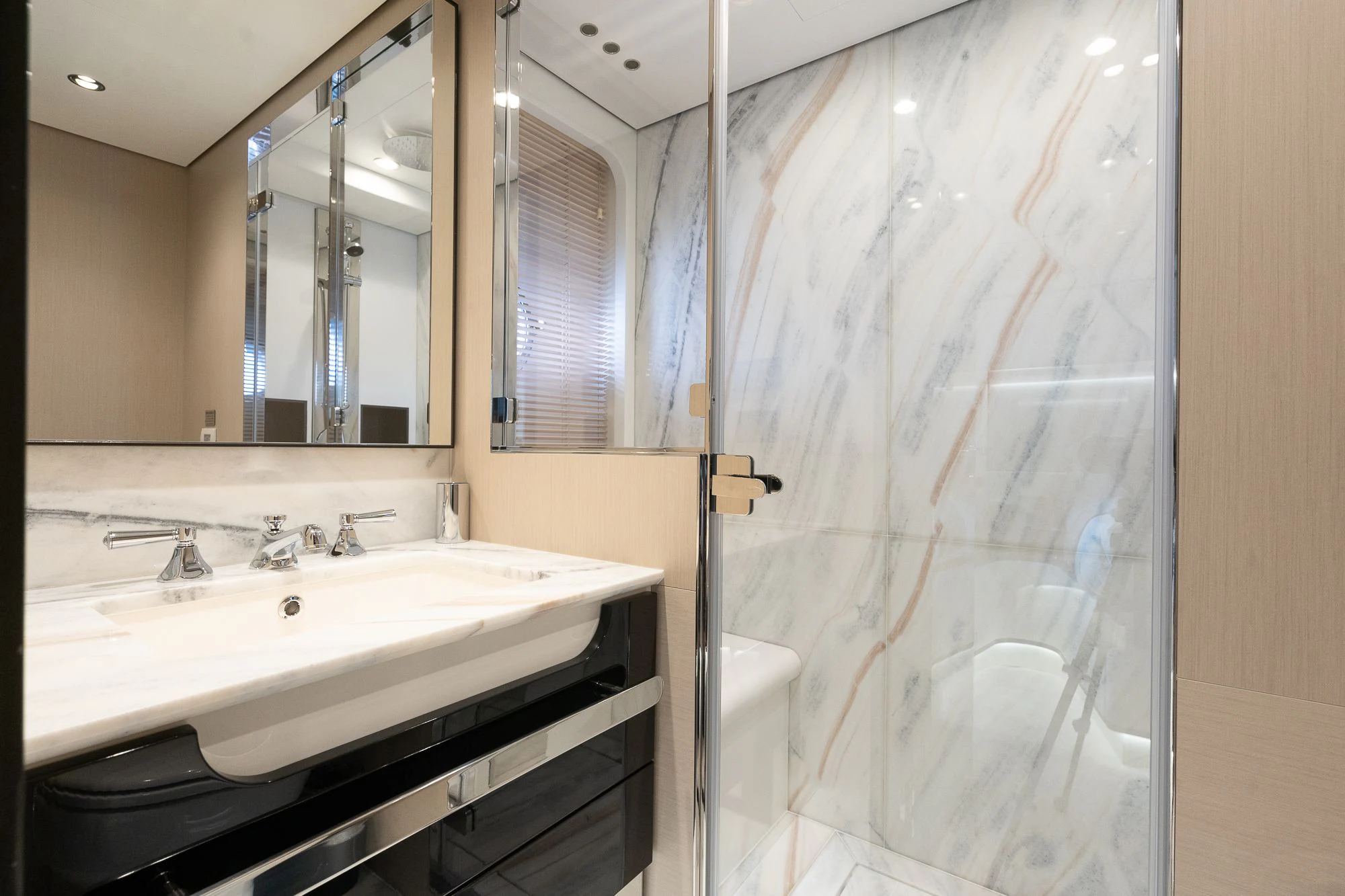 a bathroom with a shower and sink aboard SEA OWL Yacht for Sale