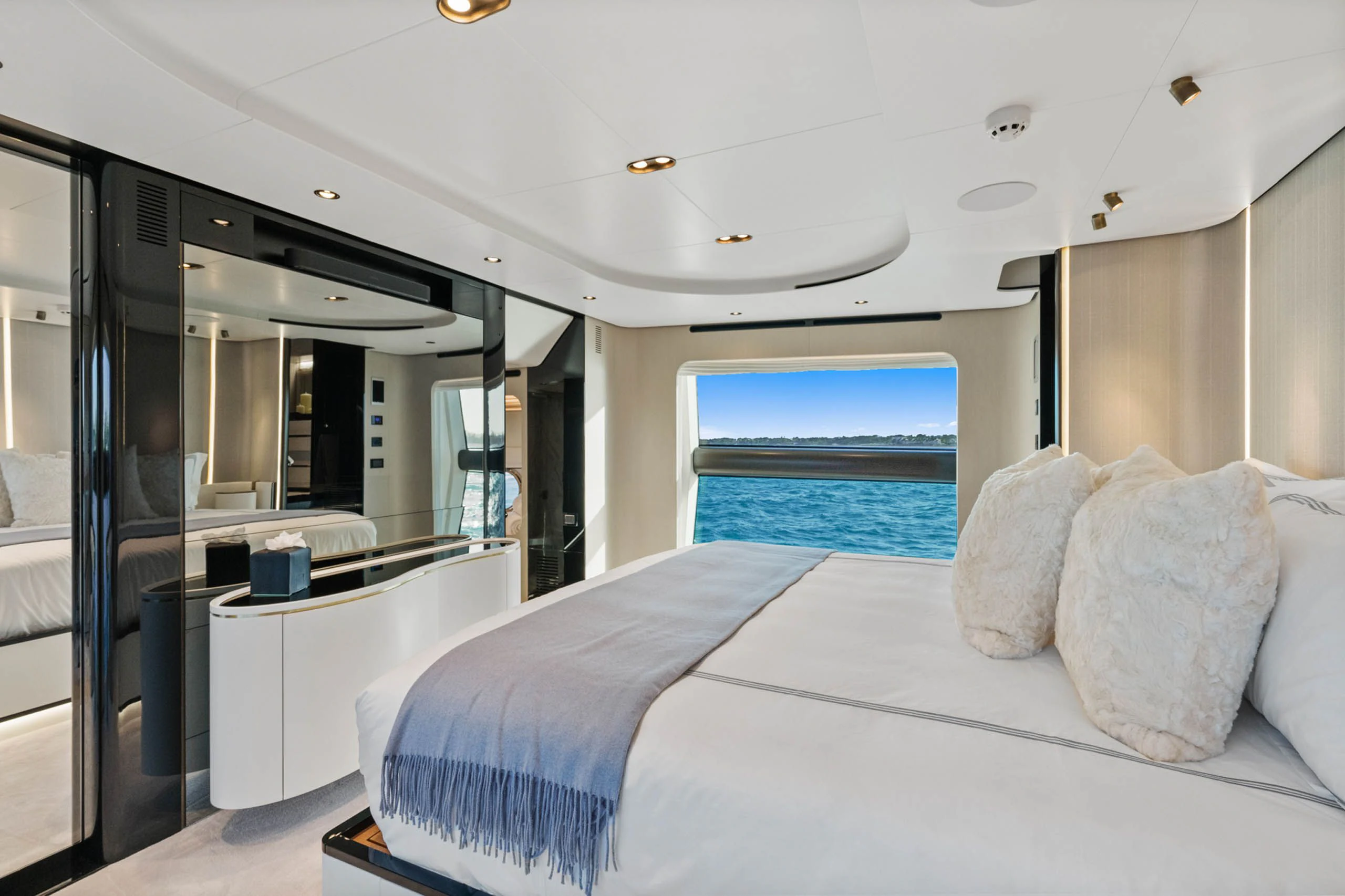 a room with a bed and a window aboard SEA OWL Yacht for Sale