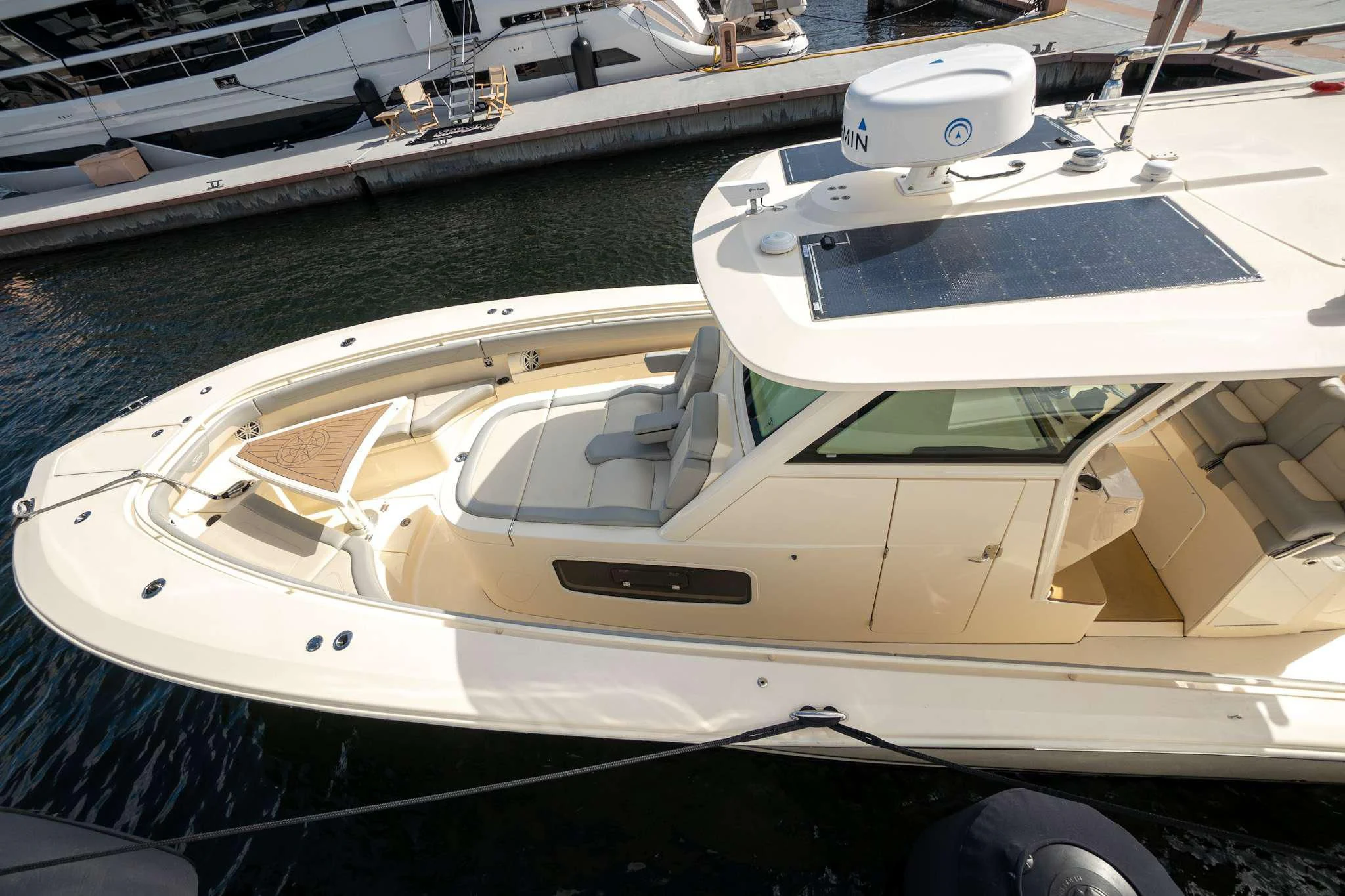 a white boat with a white roof aboard SEA OWL Yacht for Sale