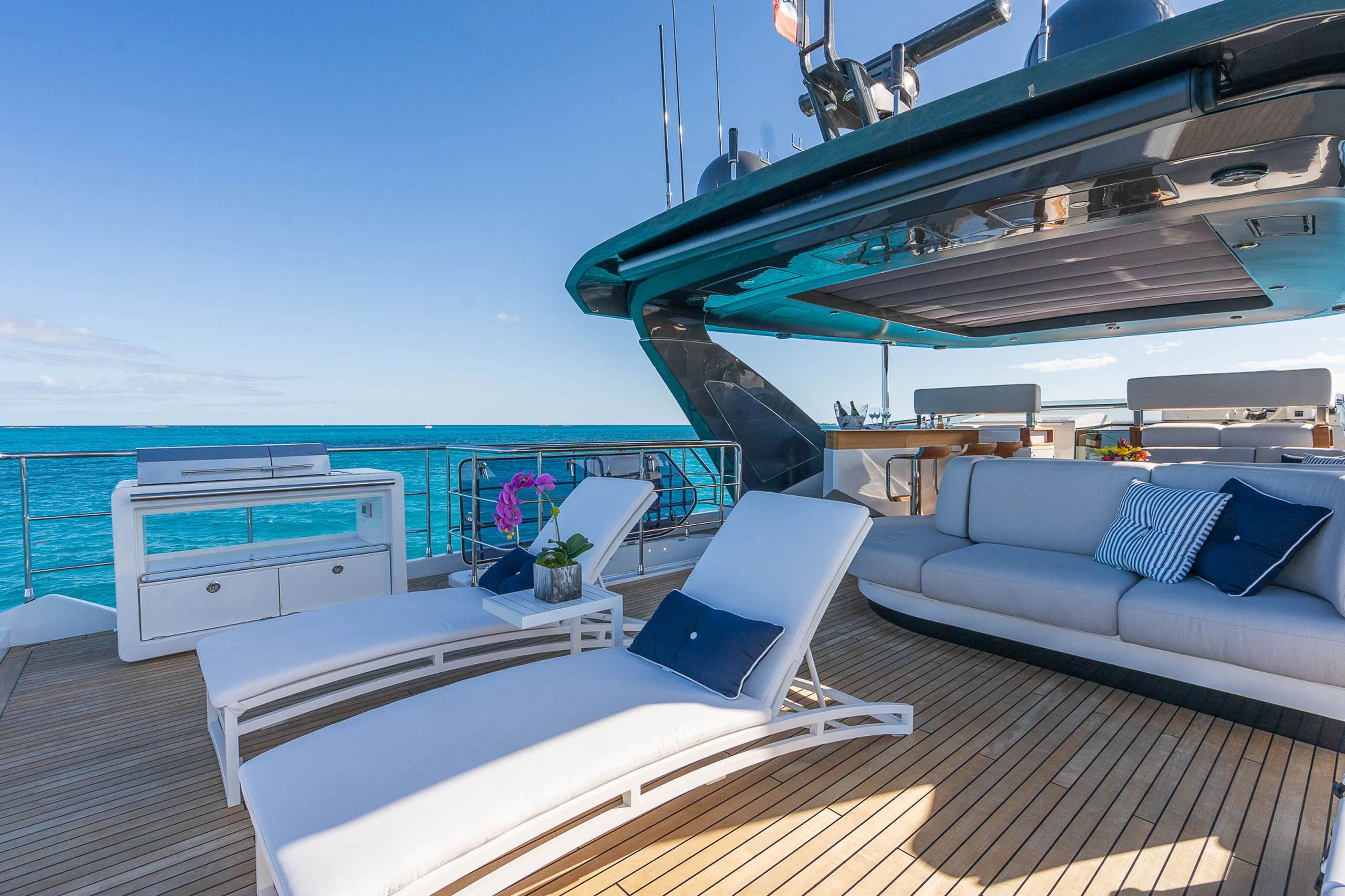 a room with a bed and a couch aboard SEA OWL Yacht for Sale