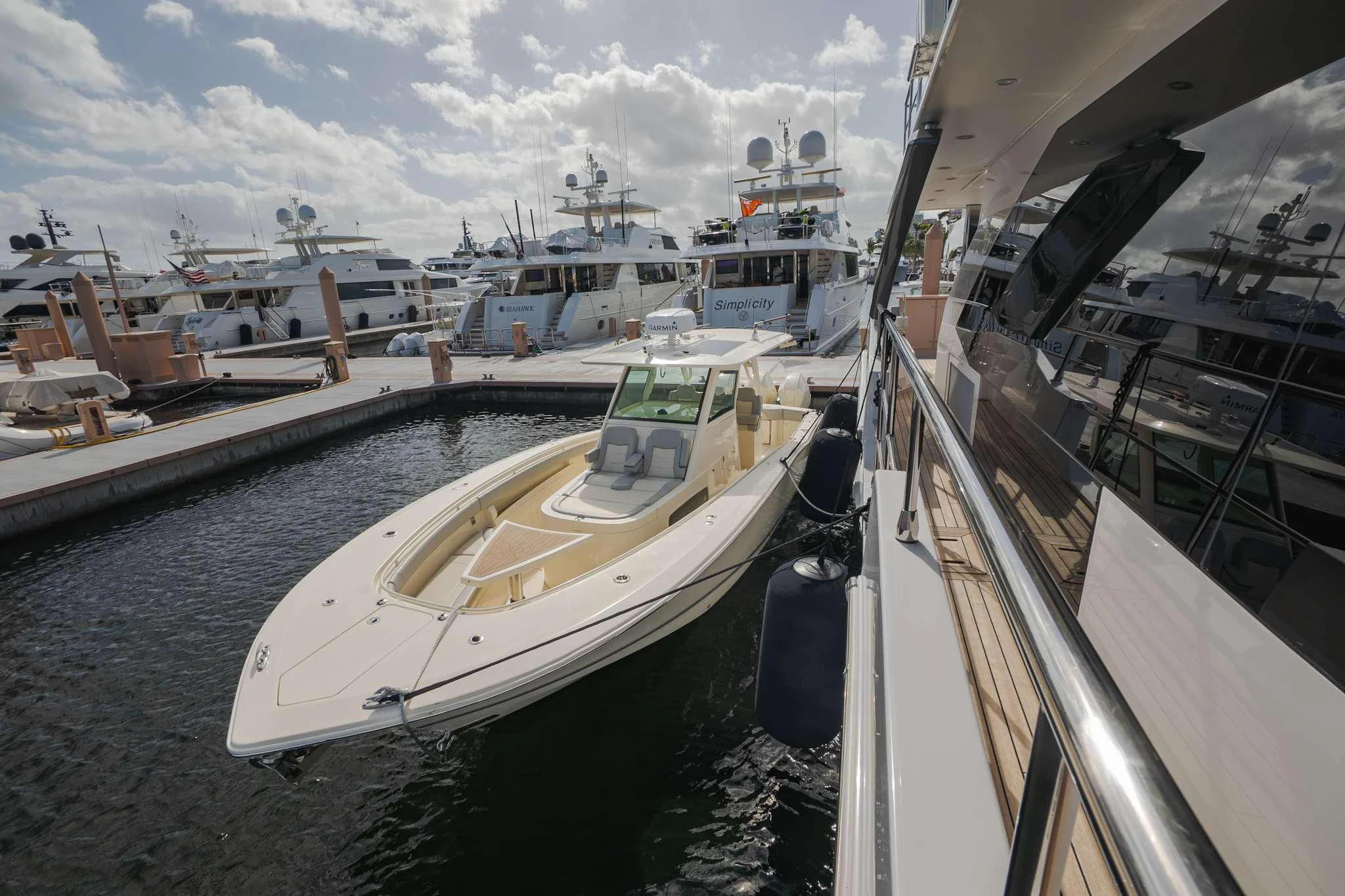 a boat docked at a port aboard SEA OWL Yacht for Sale