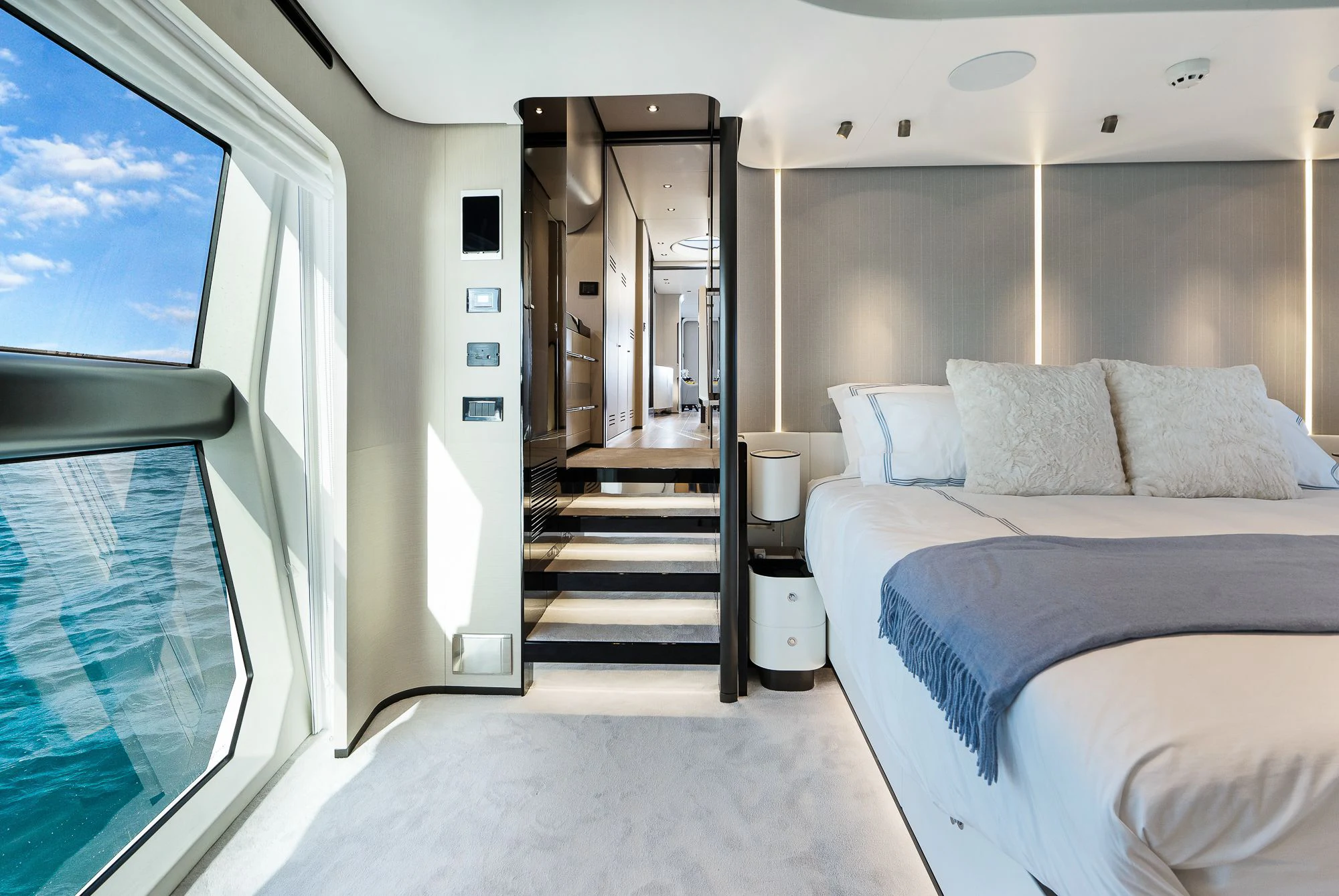 a room with a bed and a window aboard SEA OWL Yacht for Sale