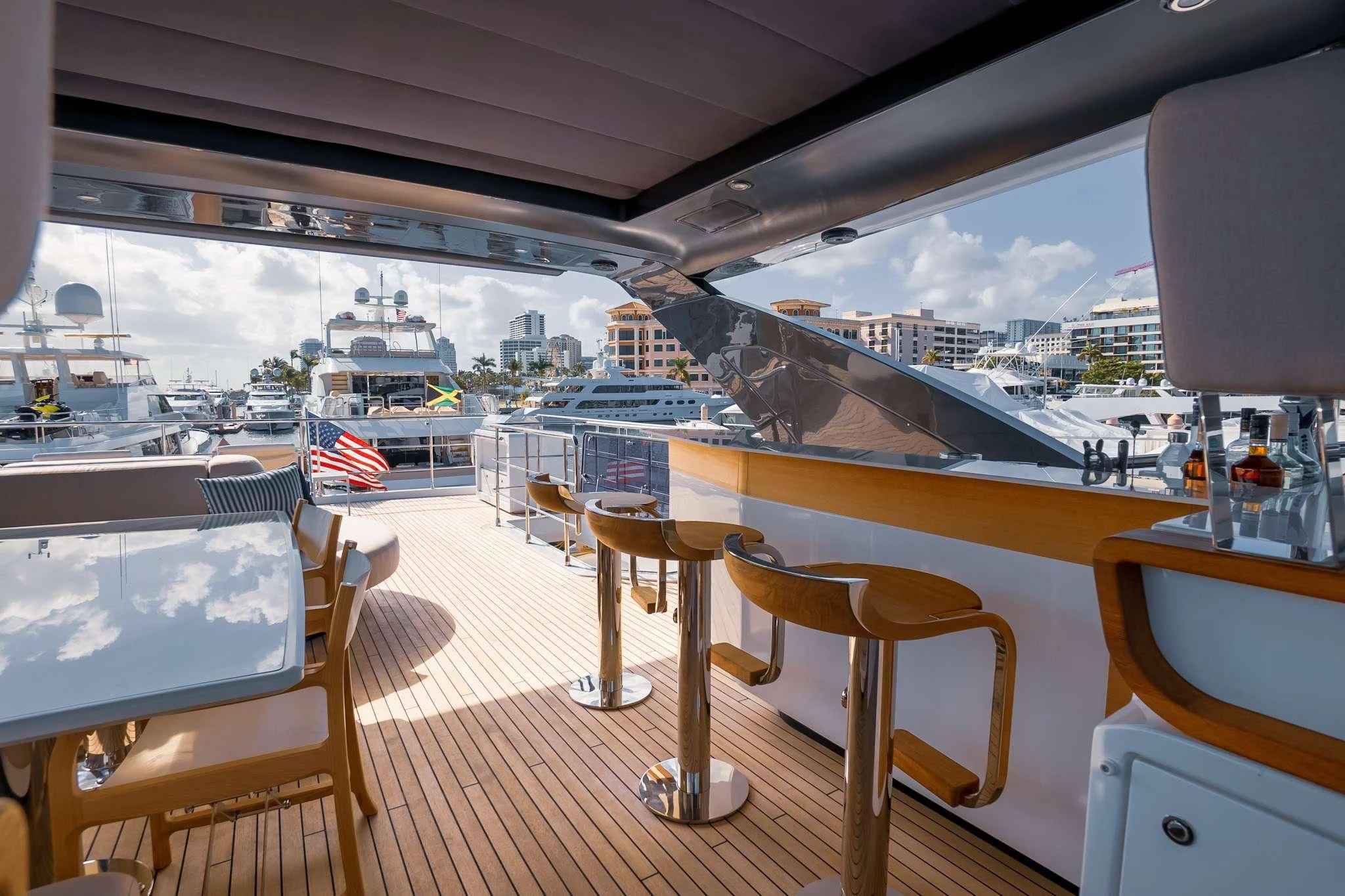 a room with a view of a city and a harbor aboard SEA OWL Yacht for Sale
