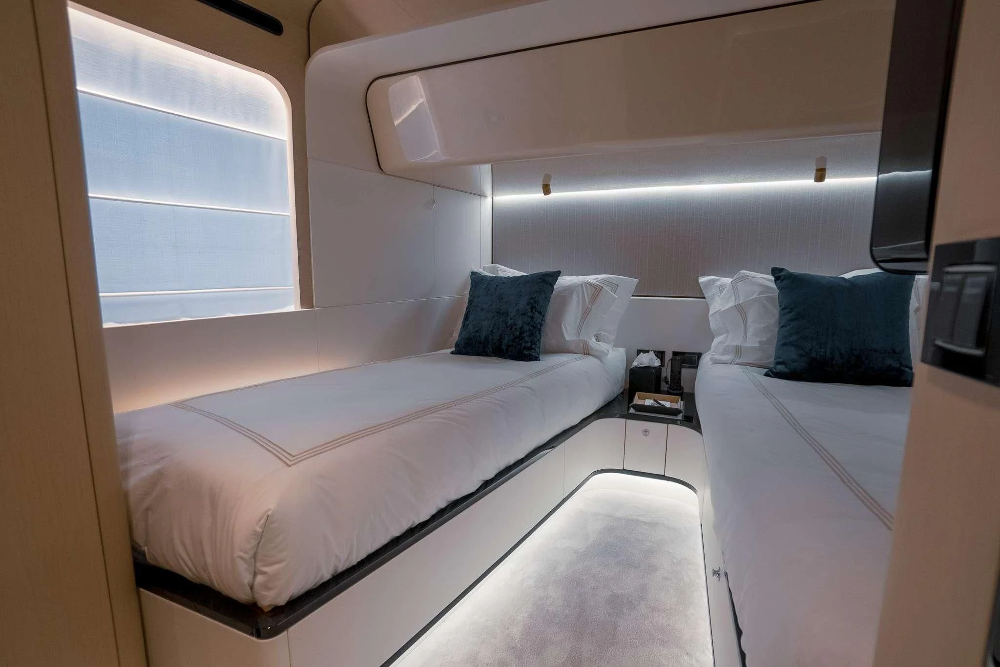 a room with two beds aboard SEA OWL Yacht for Sale