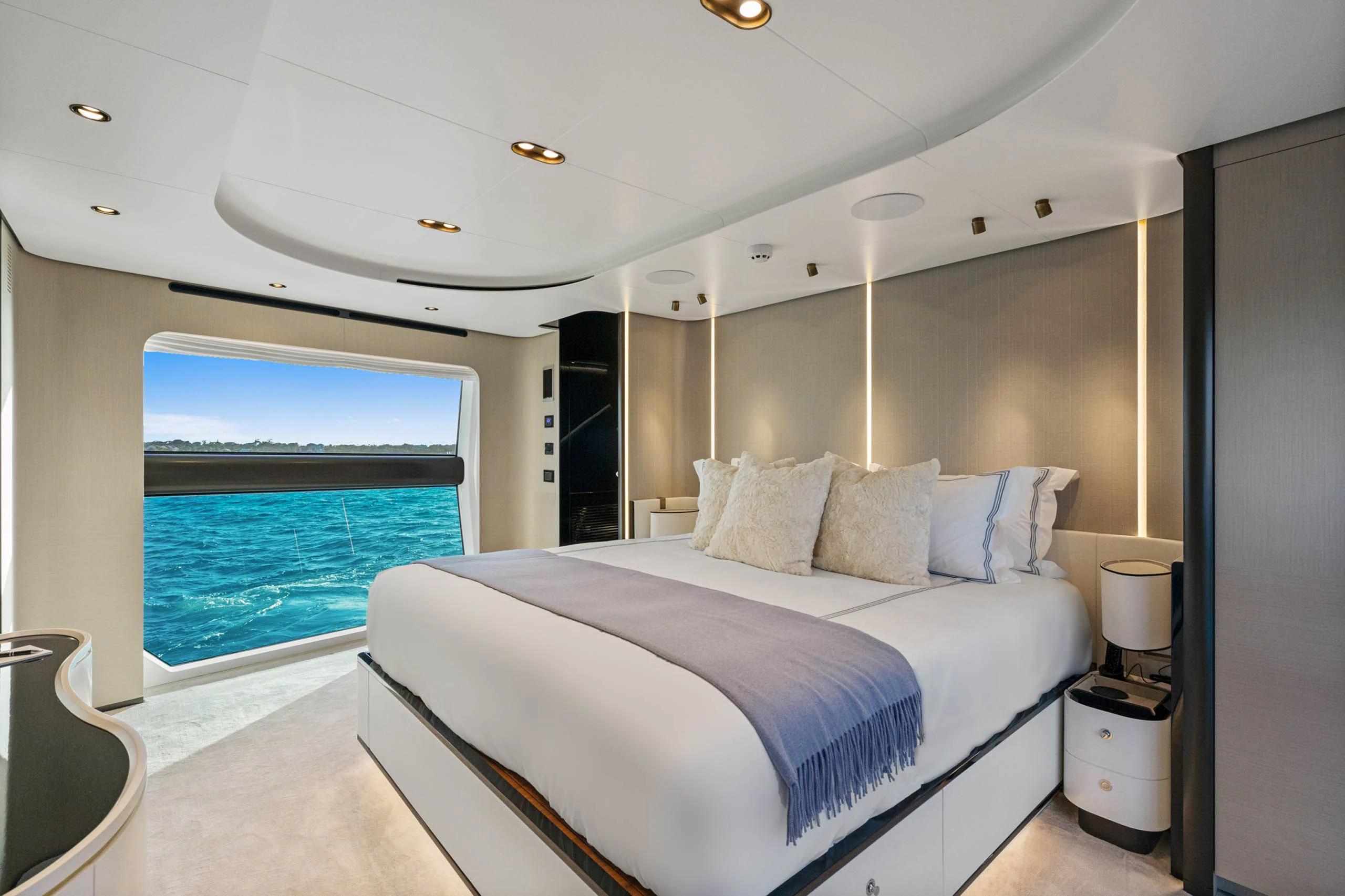 a large bedroom with a large bed aboard SEA OWL Yacht for Sale