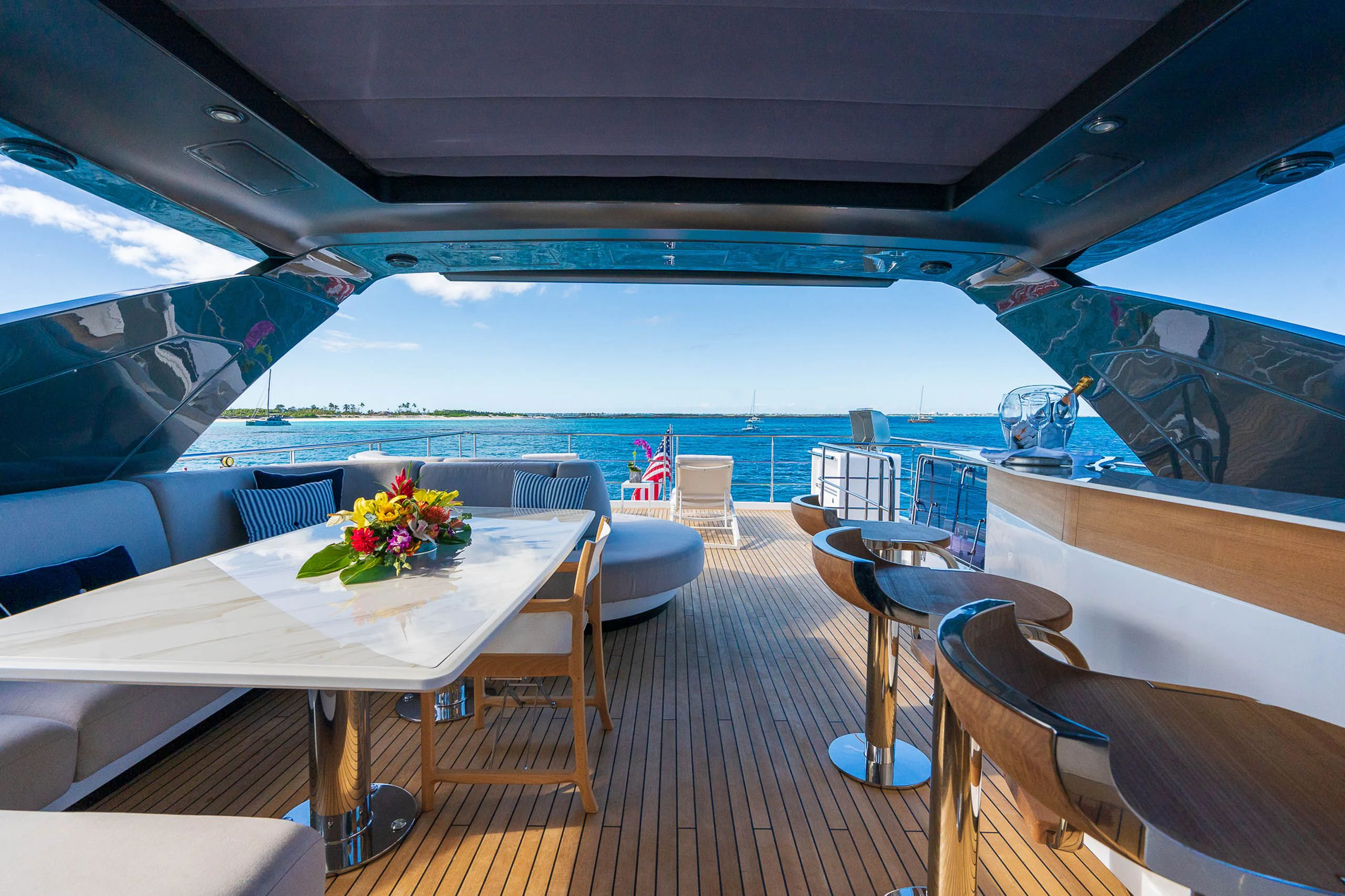 a boat with a table and chairs aboard SEA OWL Yacht for Sale