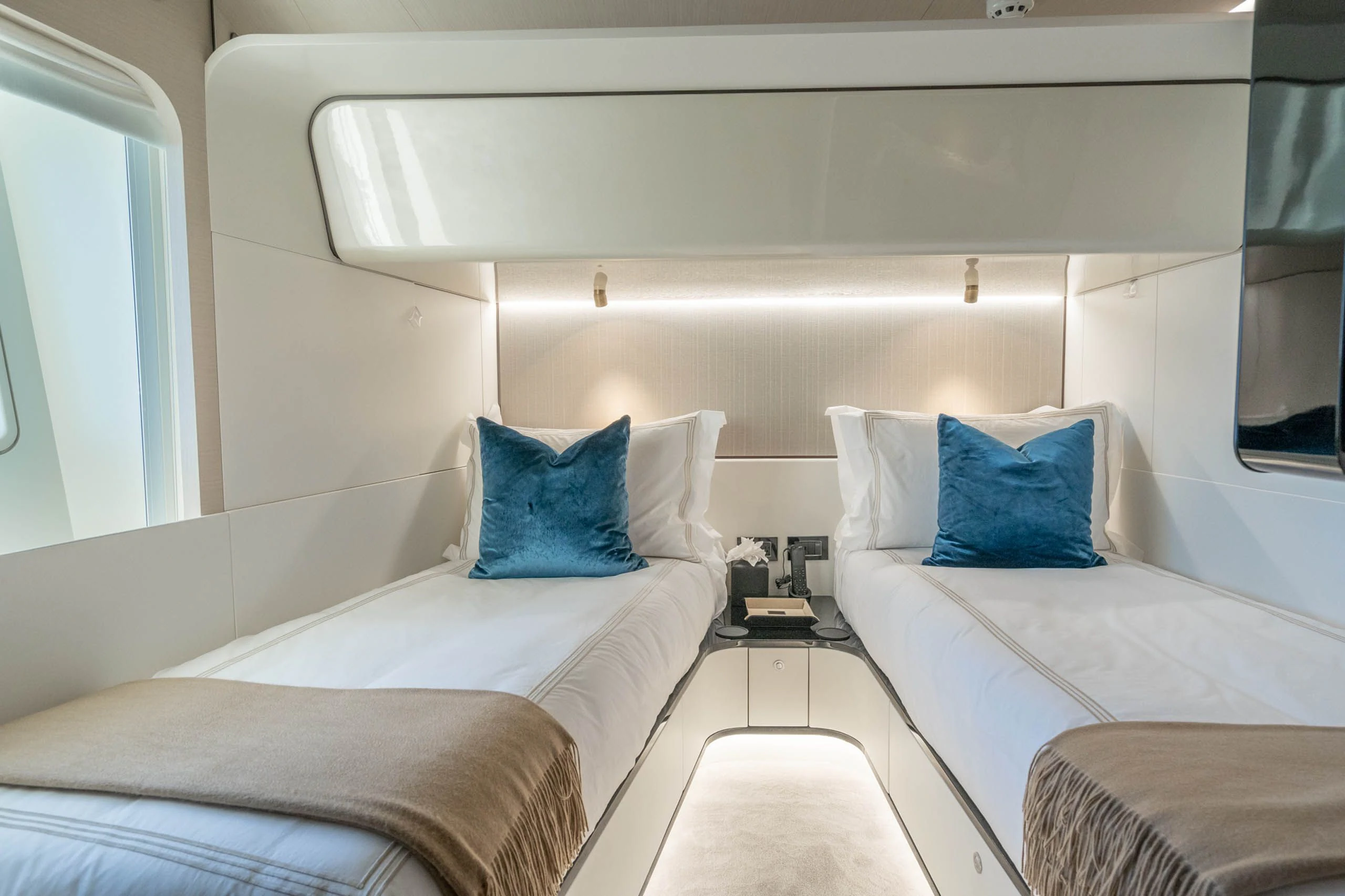 a room with two beds aboard SEA OWL Yacht for Sale