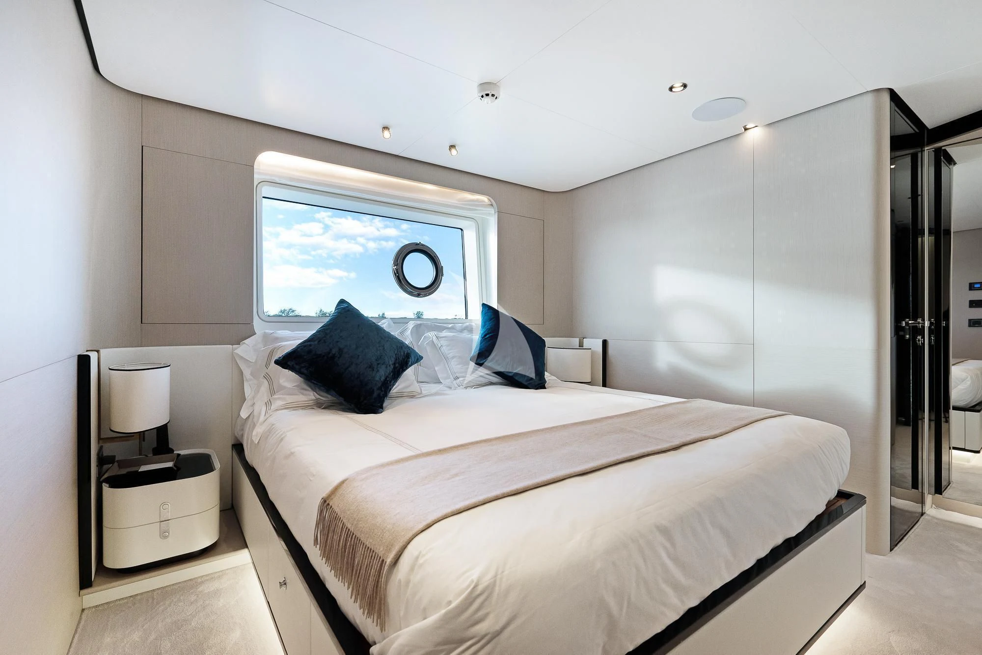 a bedroom with a large bed aboard SEA OWL Yacht for Sale