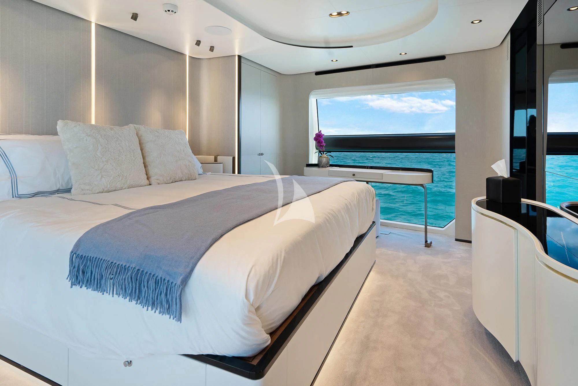 a large bed in a room aboard SEA OWL Yacht for Sale