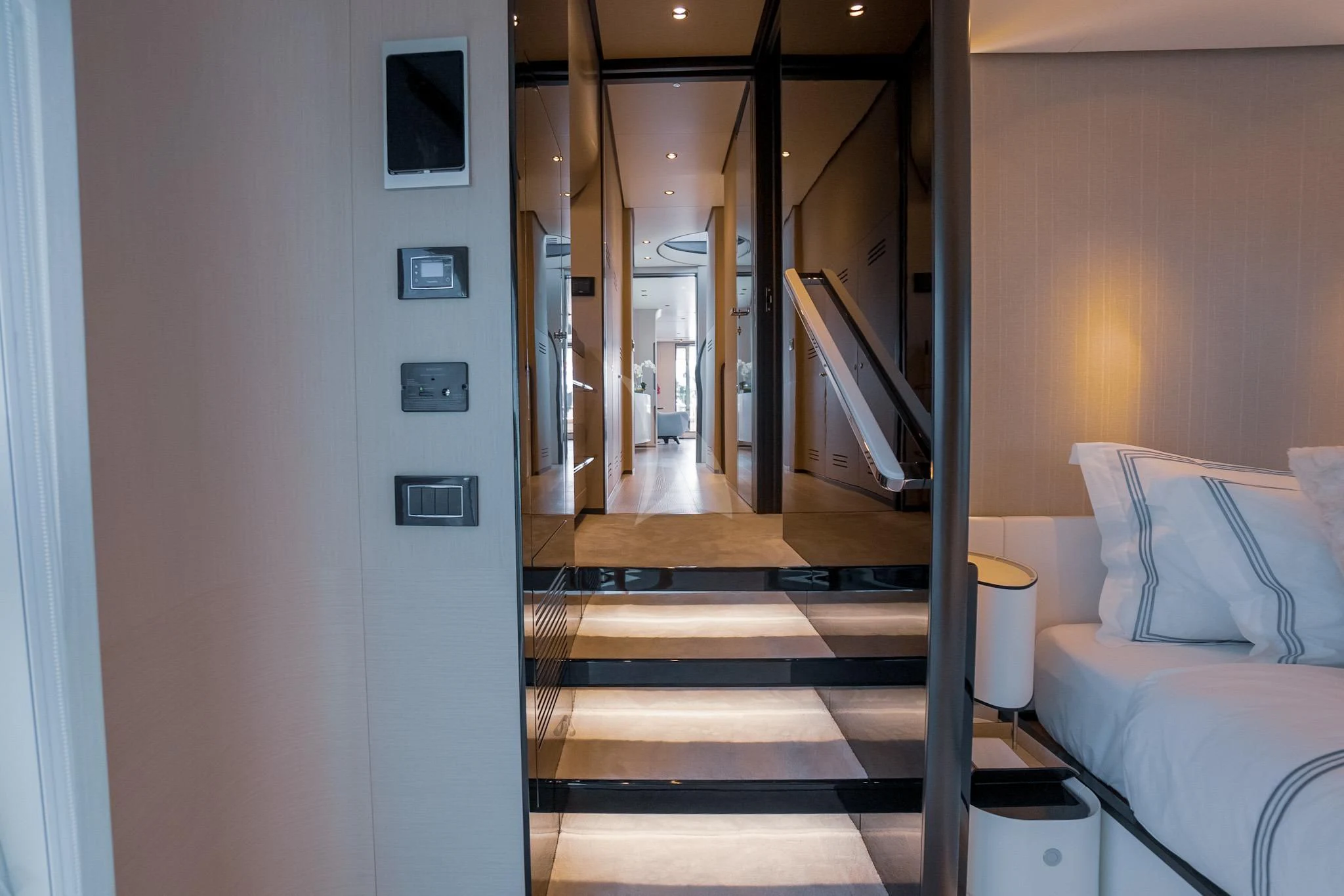 a hallway with a glass door aboard SEA OWL Yacht for Sale